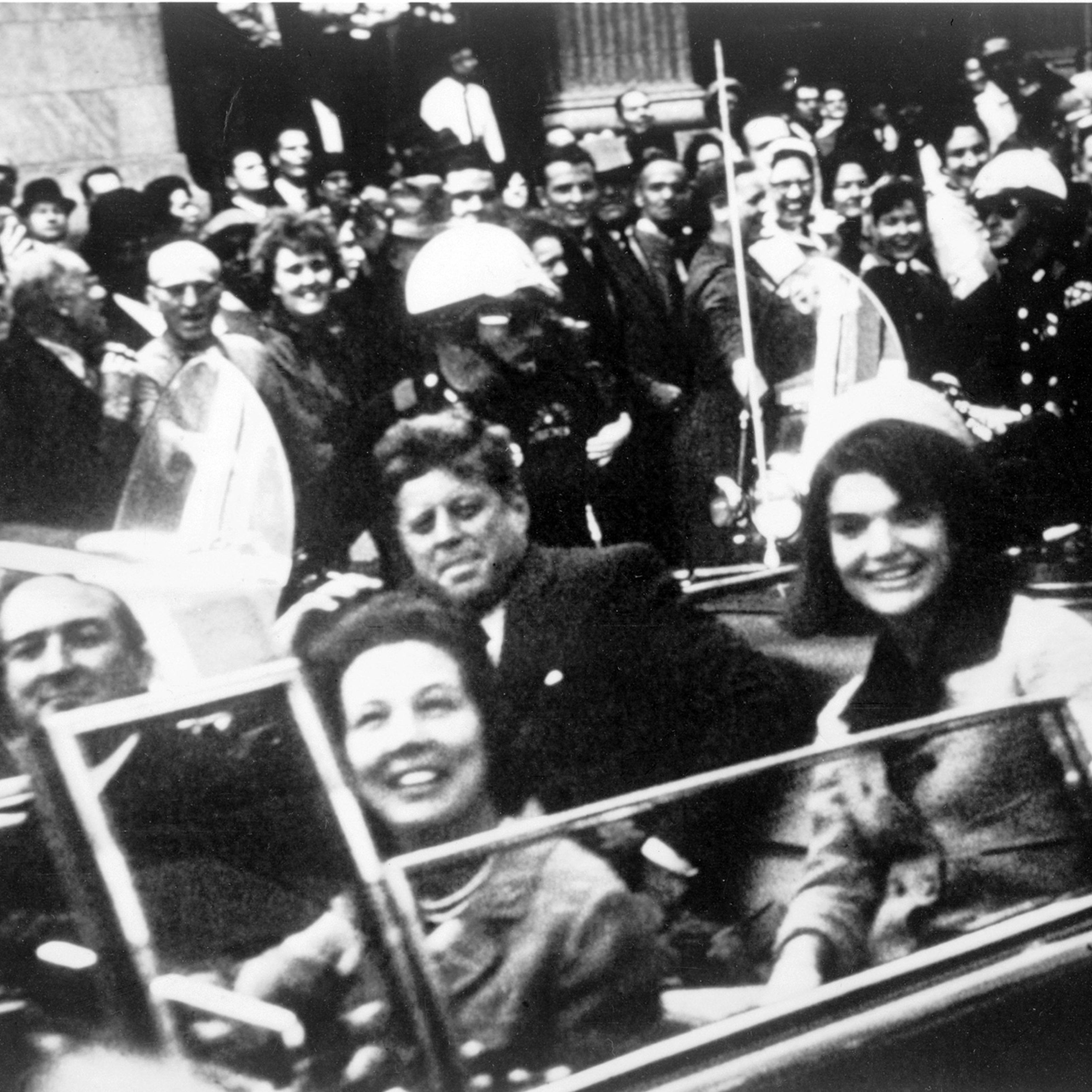 President John F. Kennedy and First Lady Jackie Onasis Kennedy in motorcade with Texas Governor John Connally and his wife in motorcade on Nov. 22, 1963, in Dallas.