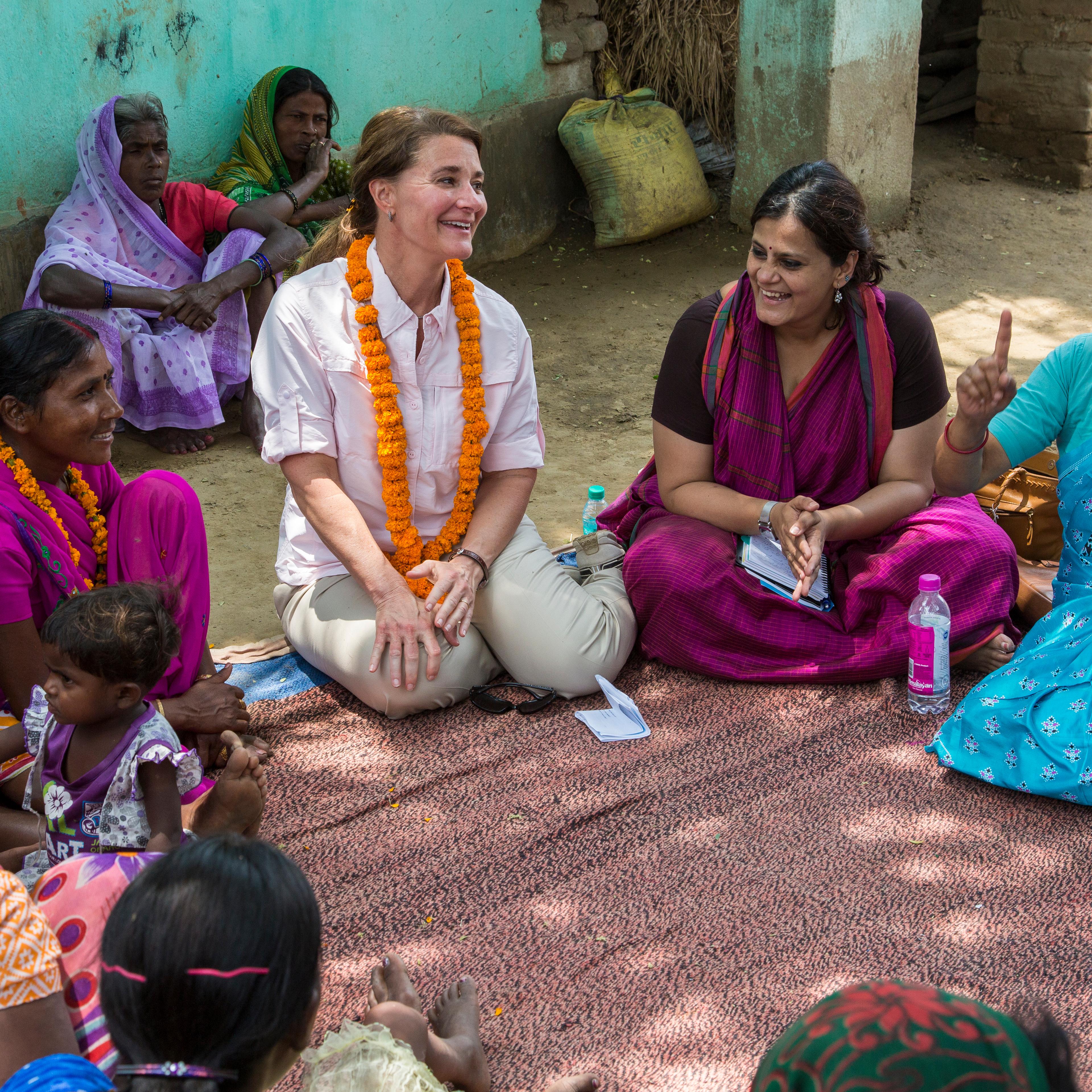 Melinda Gates during her interaction with women in Kothwa village in Danapur, Bihar, India, on April 18, 2015.She was accompanied by Sudha Varghese (light blue sari). Seated on Melinda Gates' right was Rita Devi (dark pink sari) and on her left was Yamin
