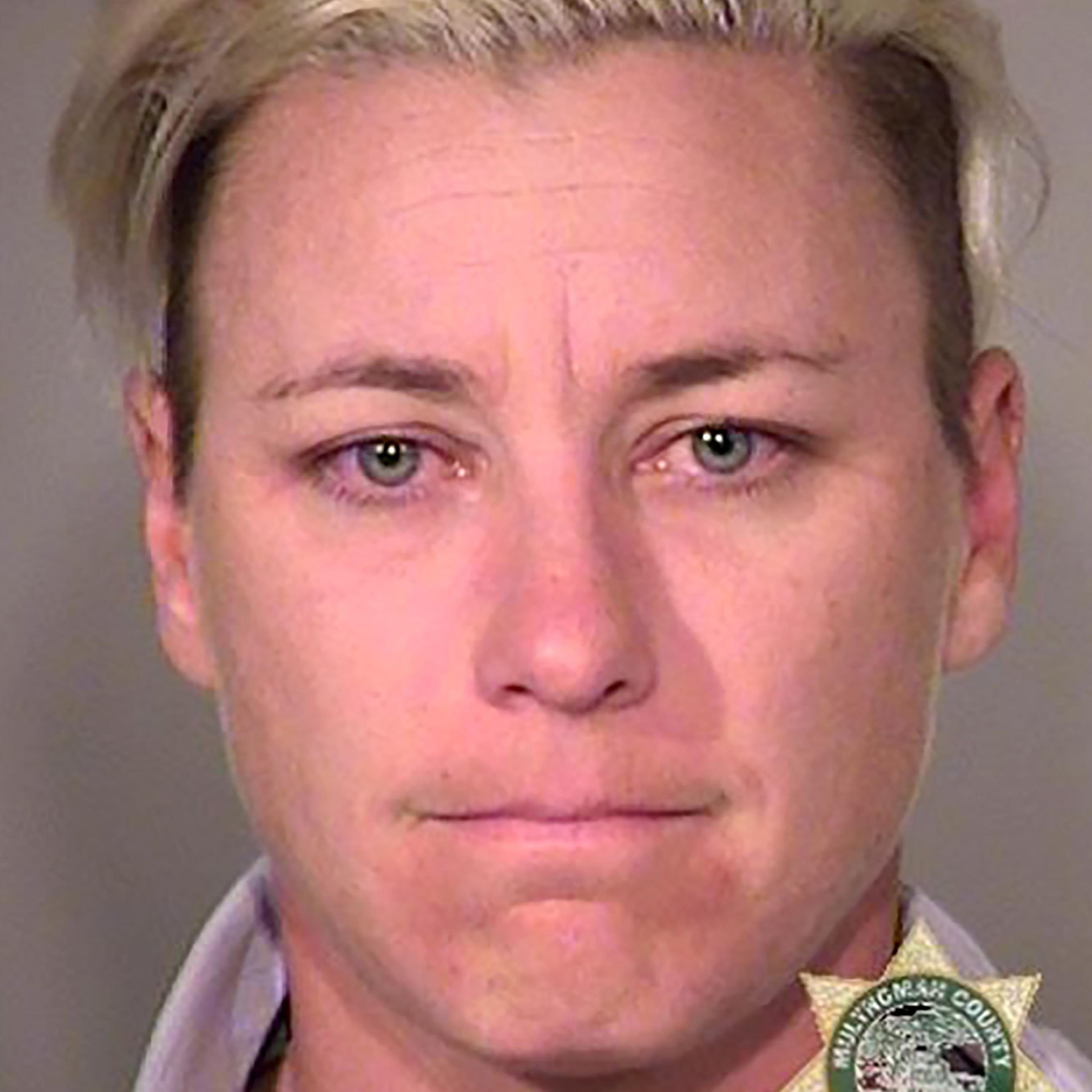 This April 3, 2016 booking photo released by the in Portland, Oregon shows American soccer star Abby Wambach.