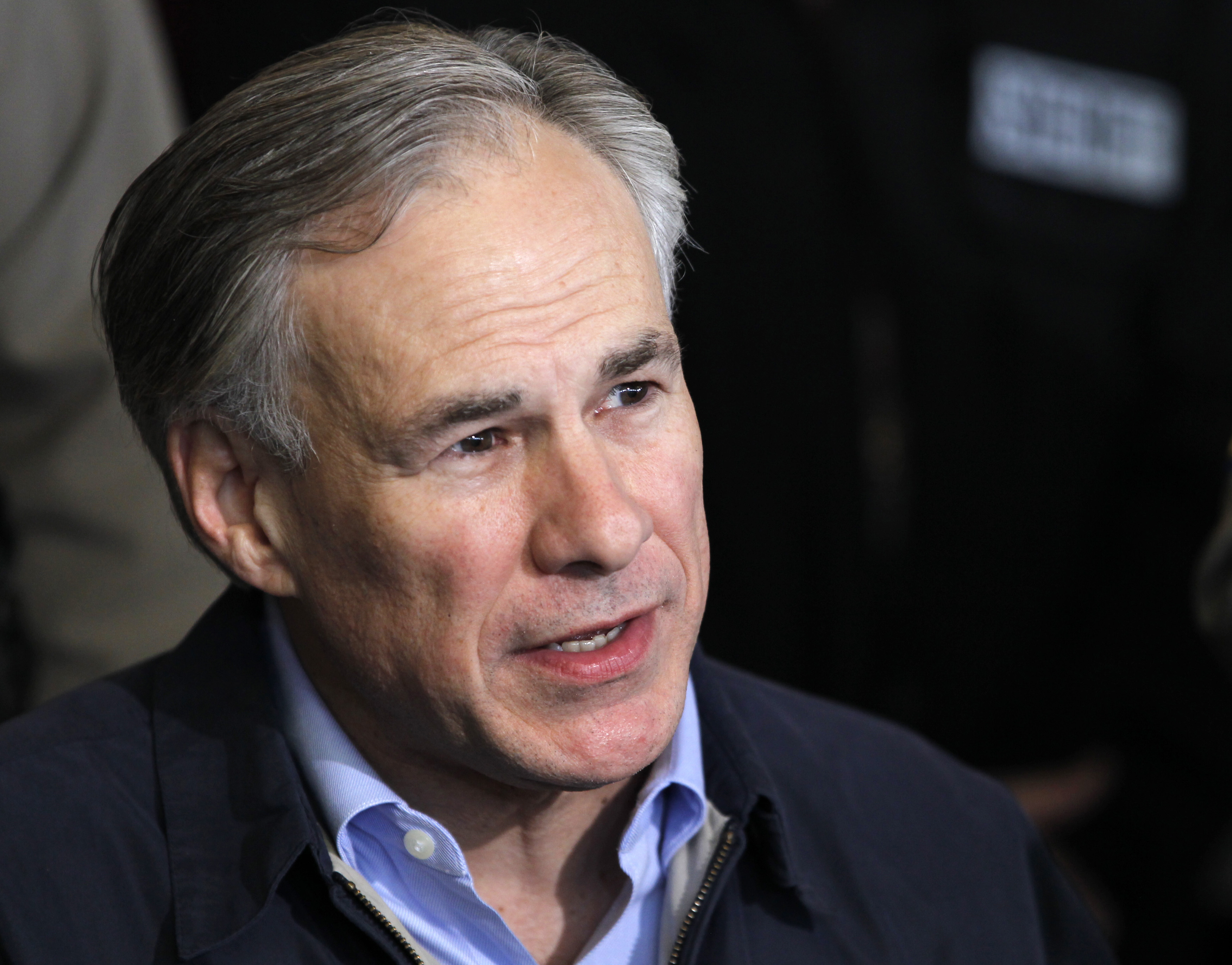 Texas Attorney General Greg Abbott speaks at a media conference a day after a massive explosion at a fertilizer plant in West Texas