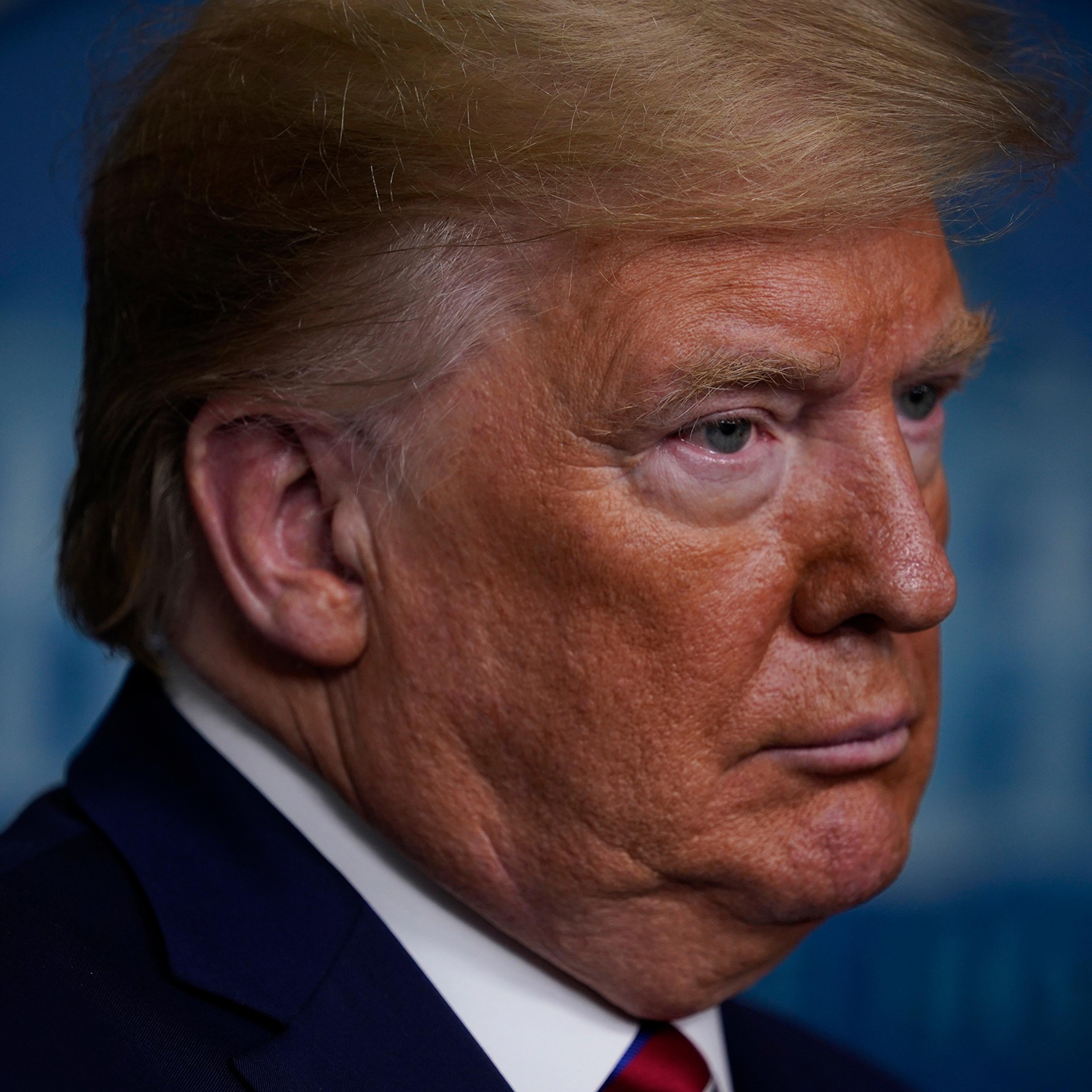 President Donald Trump listens during a coronavirus task force briefing at the White House, Friday, March 20