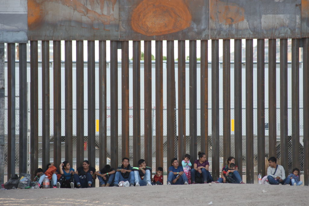 Central American Migrants Cross The Rio Bravo To Surrender To Border Patrol