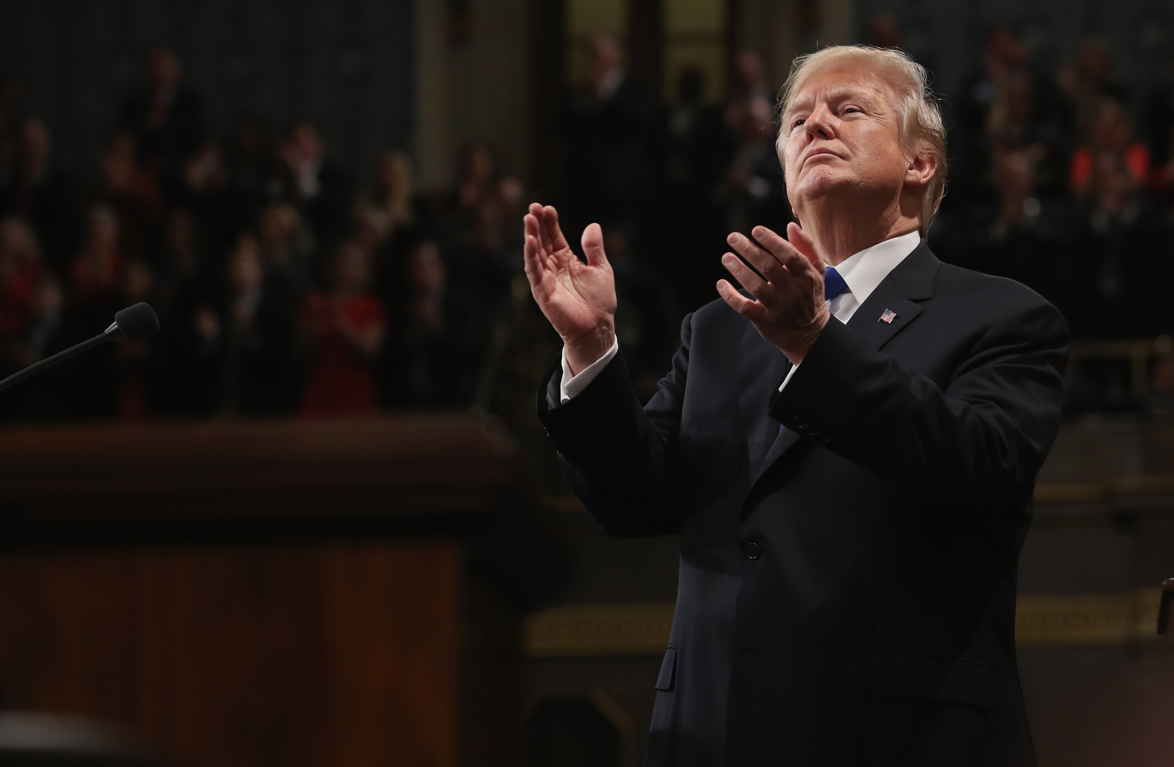 U.S. President Donald J. Trump claps during the State of the Union address in the chamber of the U.S. House of Representatives January 30, 2018 in Washington, DC.