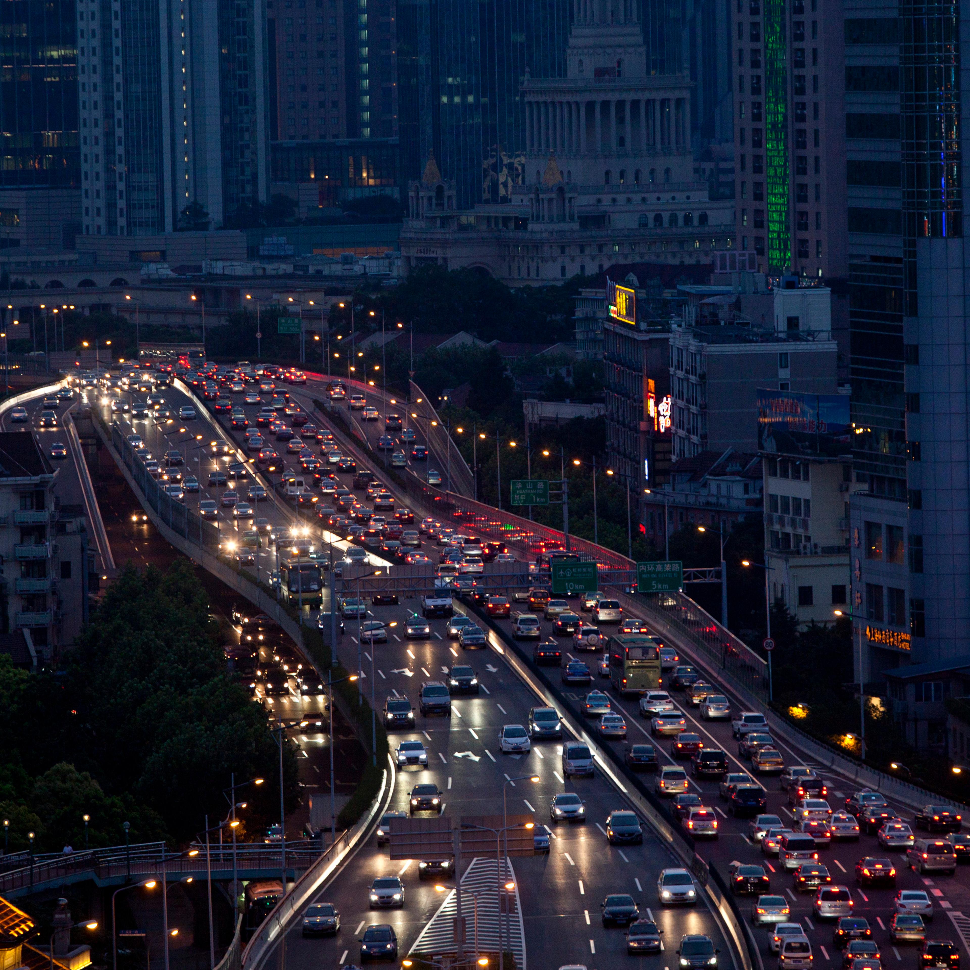 Lines of cars are pictured during a rush hour traffic jam in central Shanghai July 11, 2013.