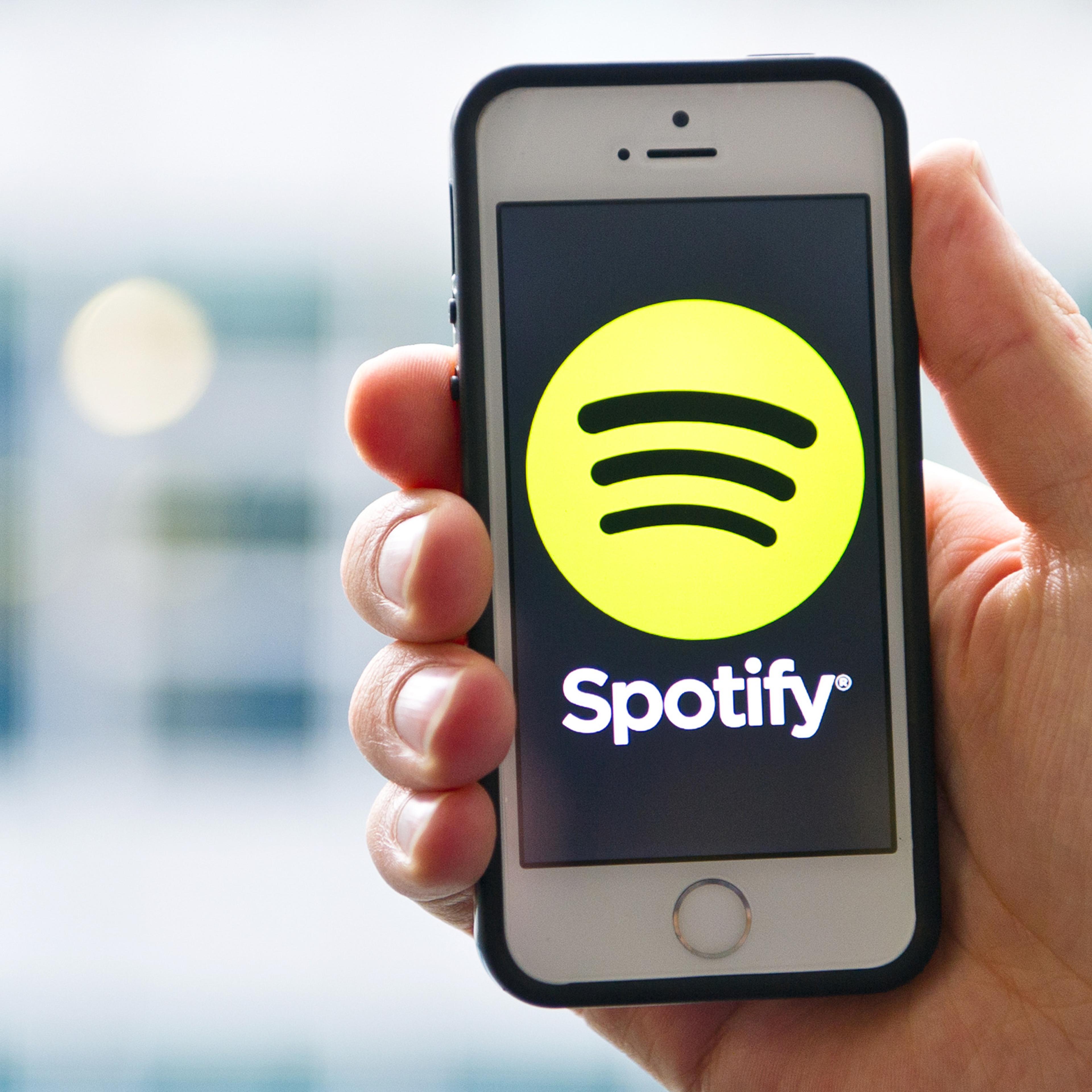 Spotify logo displayed on an iPhone.