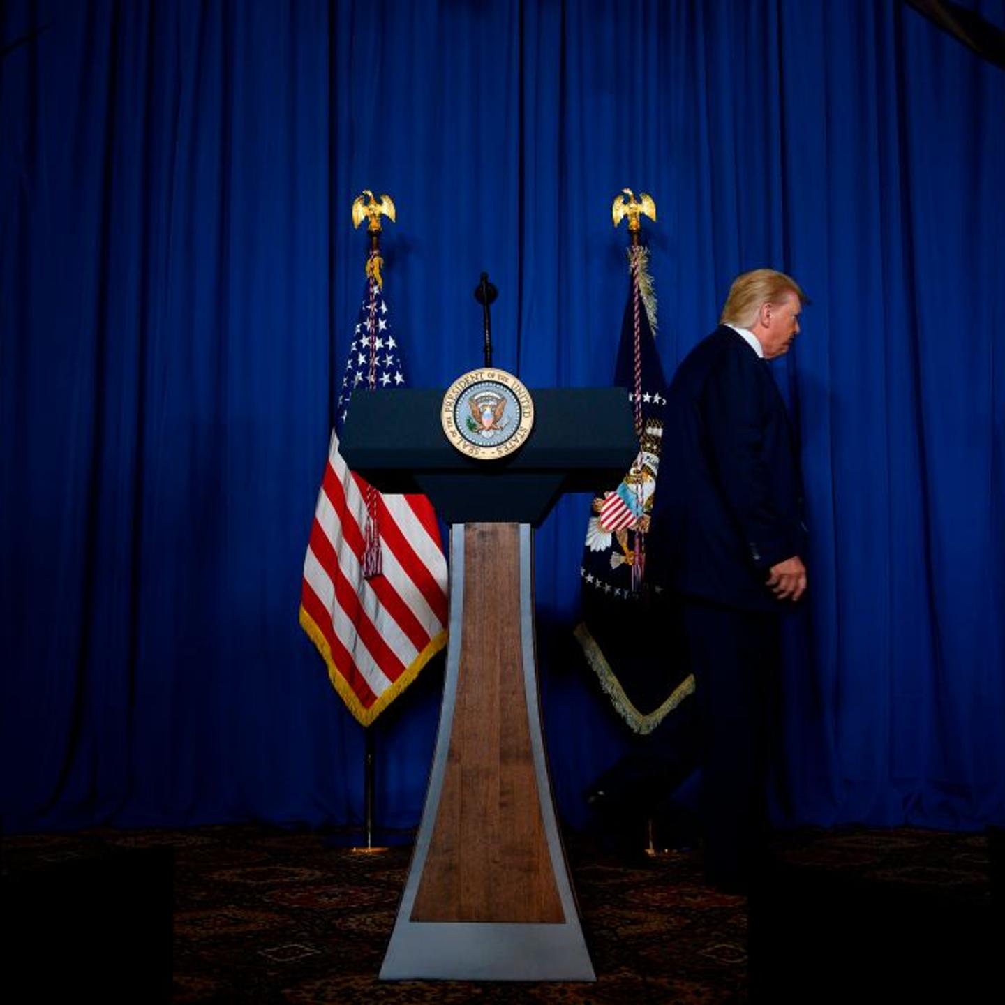 President Donald Trump leaves after making a statement on Iran