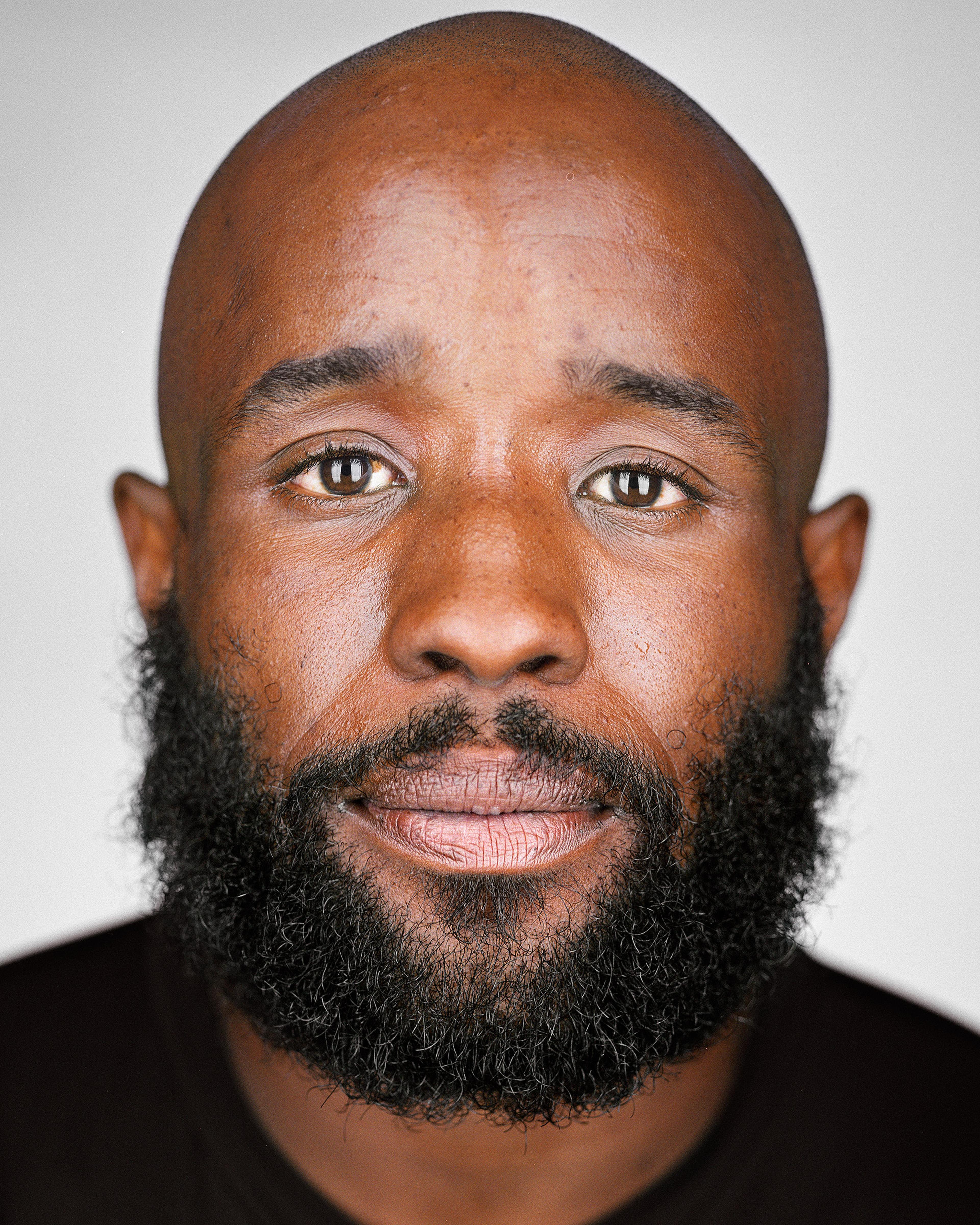 Martin: "How long have you been out here on the streets?” Markeith: “I’ve been out here since 2004. I was in tenth grade. My mother passed away and left me kinda...My dad’s a crack head so I didn't really have too much family. I’m from the Highlands. I been out here for quite awhile. But I try to be upbeat about it.” Martin: “You quit school at grade ten then?”
Markeith: “Yeah.” Martin: “Your mom must have been really young when she passed away, man.” Markeith: “Yeah, she was late thirties.” Martin: “Drug related?” Markeith: “She was shot in the spinal cord. Her boyfriend was selling drugs. They came lookin’ for him and killed my mom. That’s why I’m trying to keep myself away from all of that.” —Markeith Watson, Oct. 27, 2015.