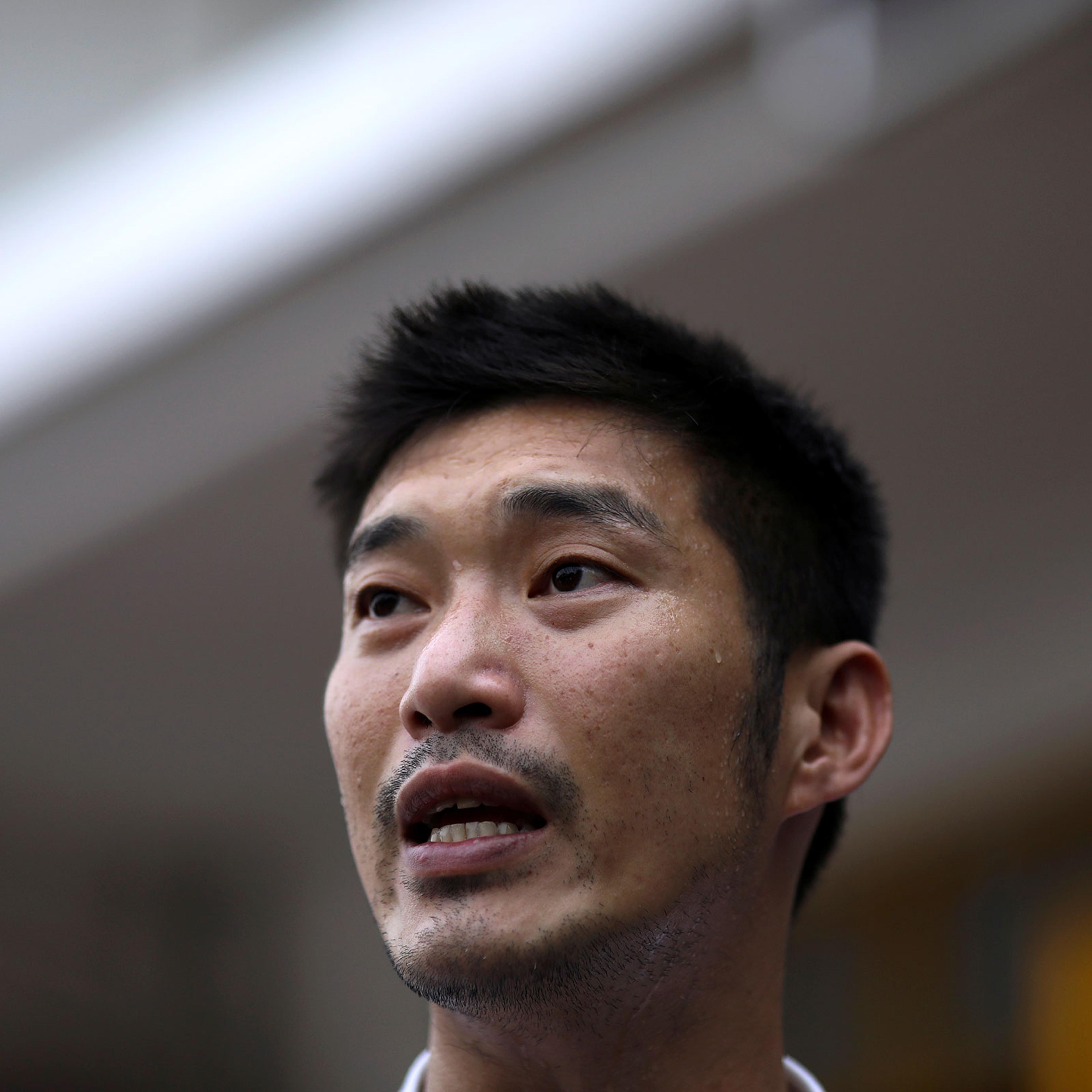 Thailand's opposition Future Forward Party leader Thanathorn Juangroongruangkit speaks before he reports to a Bangkok police station to hear charges filed against him for organizing the country's biggest protest since the 2014 coup in Thailand