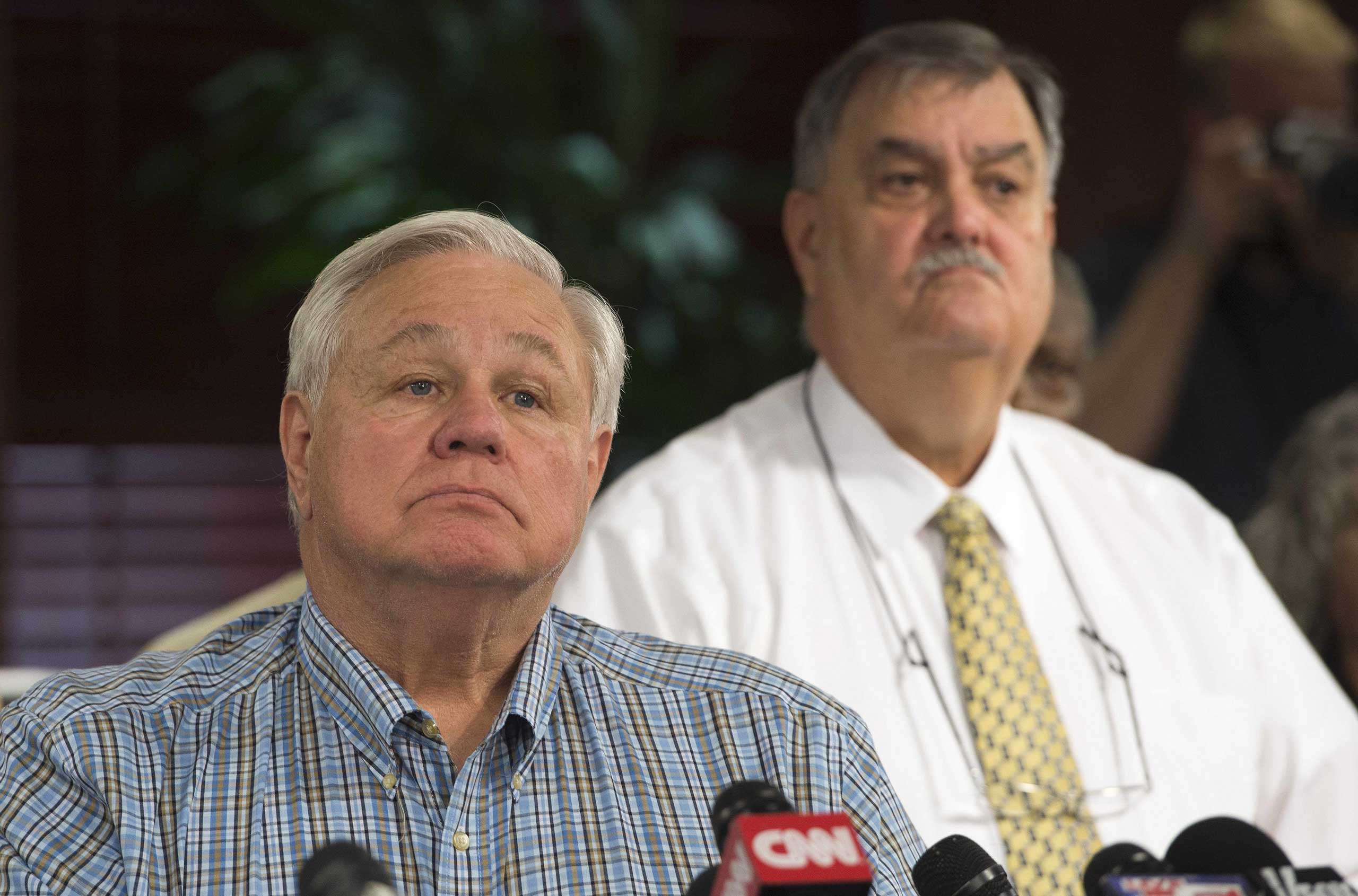 North Charleston Mayor R. Keith Summey (L) and Police Chief Eddie Driggers take questions during a press conference at City Hall in Charleston, S.C. on April 8, 2015.
