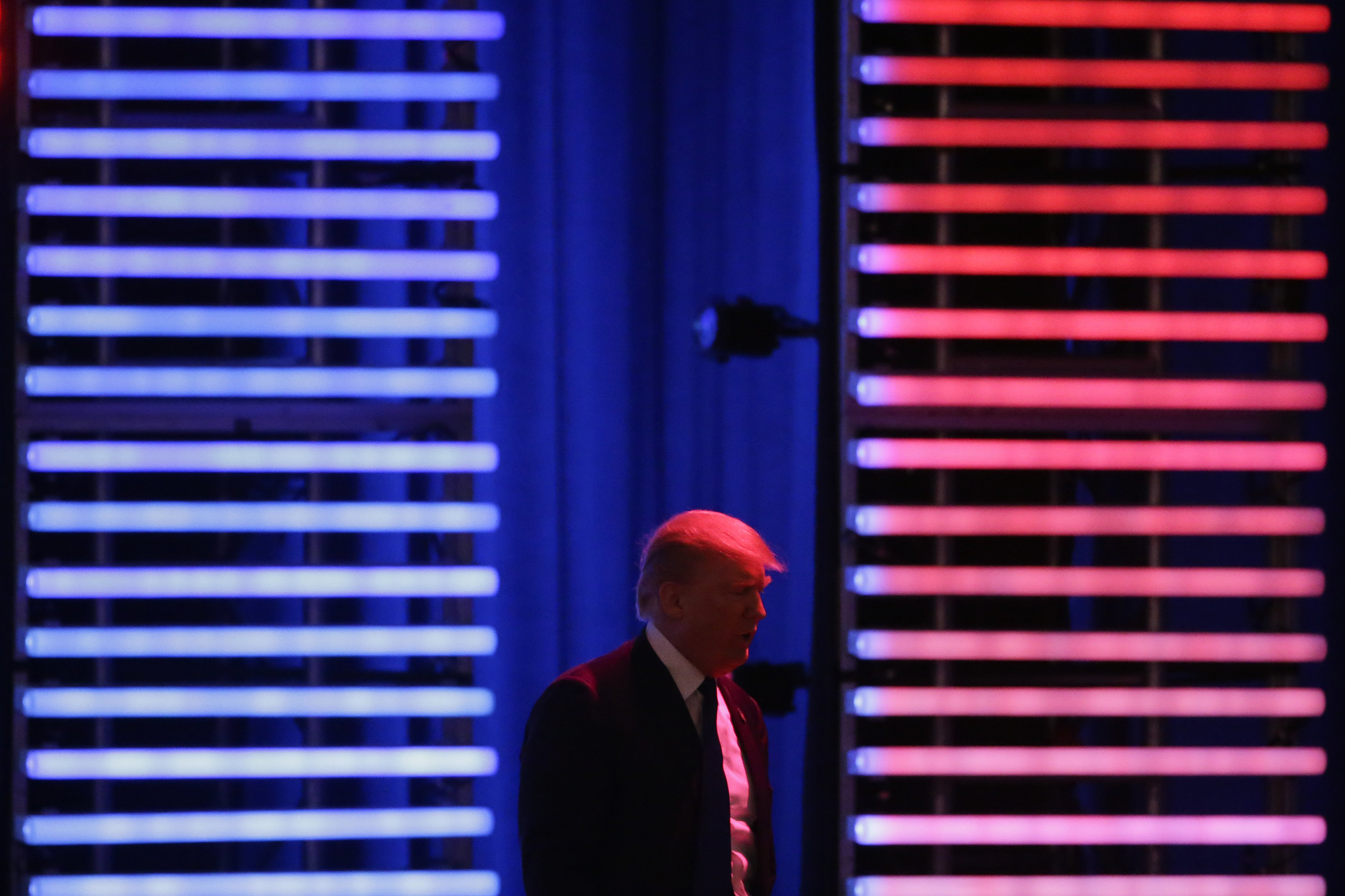 Republican presidential candidate, businessman Donald Trump walks on stage during a Republican presidential primary debate hosted by ABC News at the St. Anselm College on Saturday, Feb. 6, 2016, in Manchester, N.H.