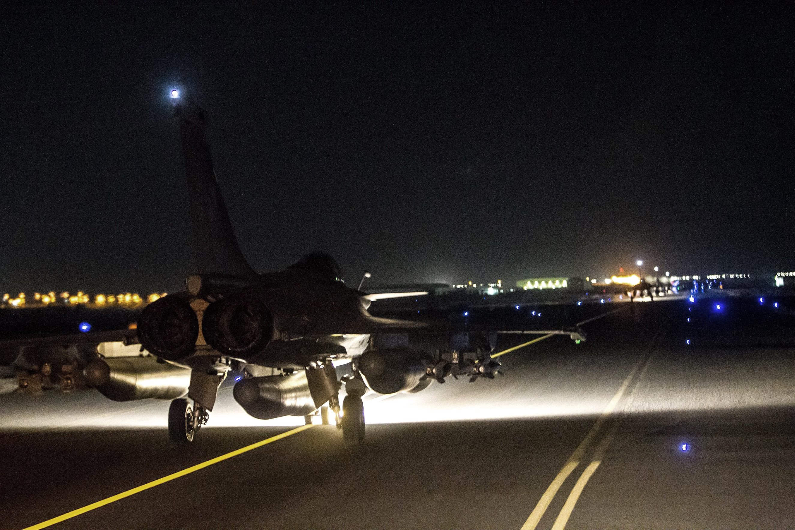 A French army jet takes off from a site in Jordan to strike at Islamic State group targets on Nov. 15, 2015.