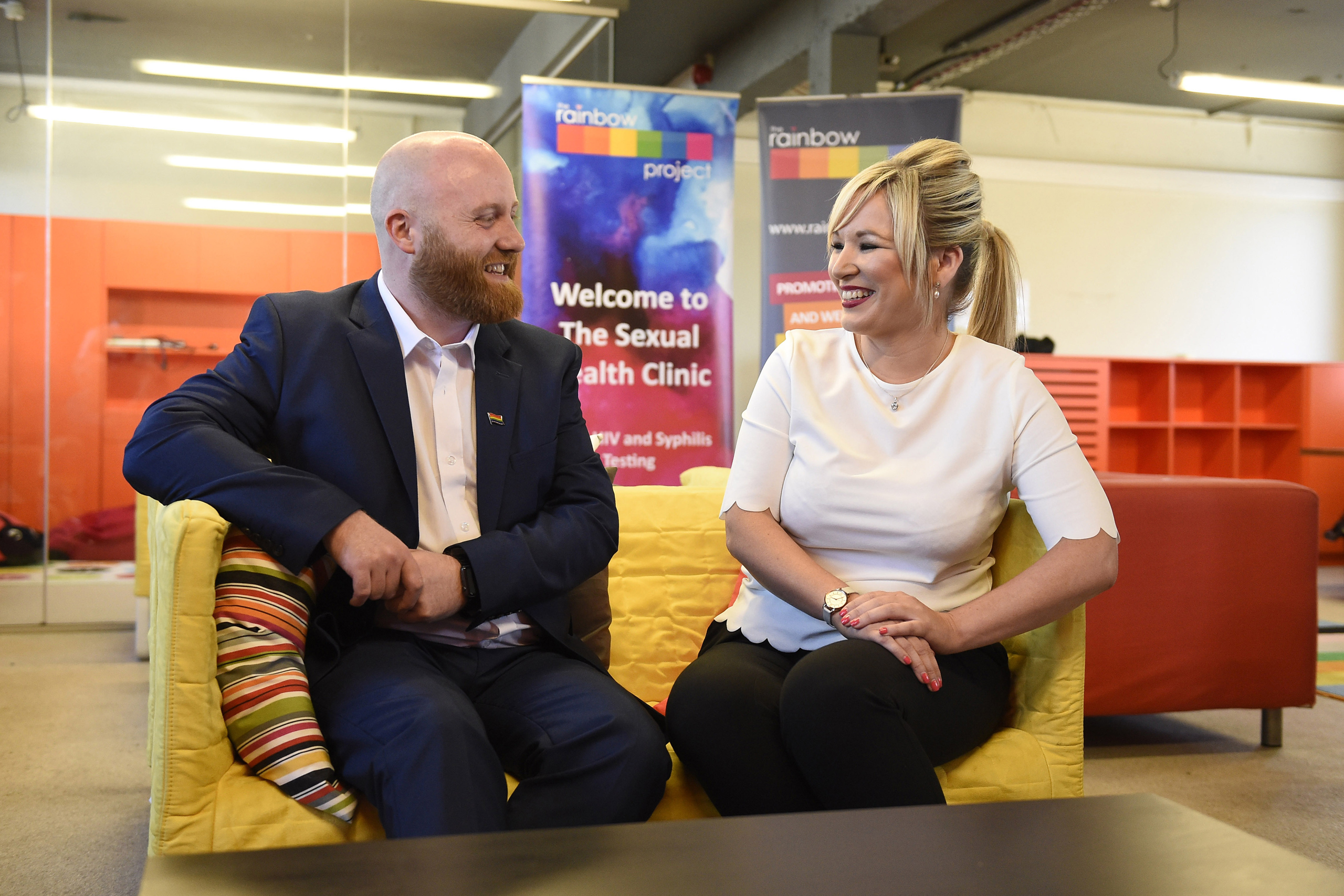 Health Minister Michelle O'Neill with John O'Doherty from The Rainbow Project which supports the LGBT community, at the organization's offices in Belfast, June 2, 2016.
