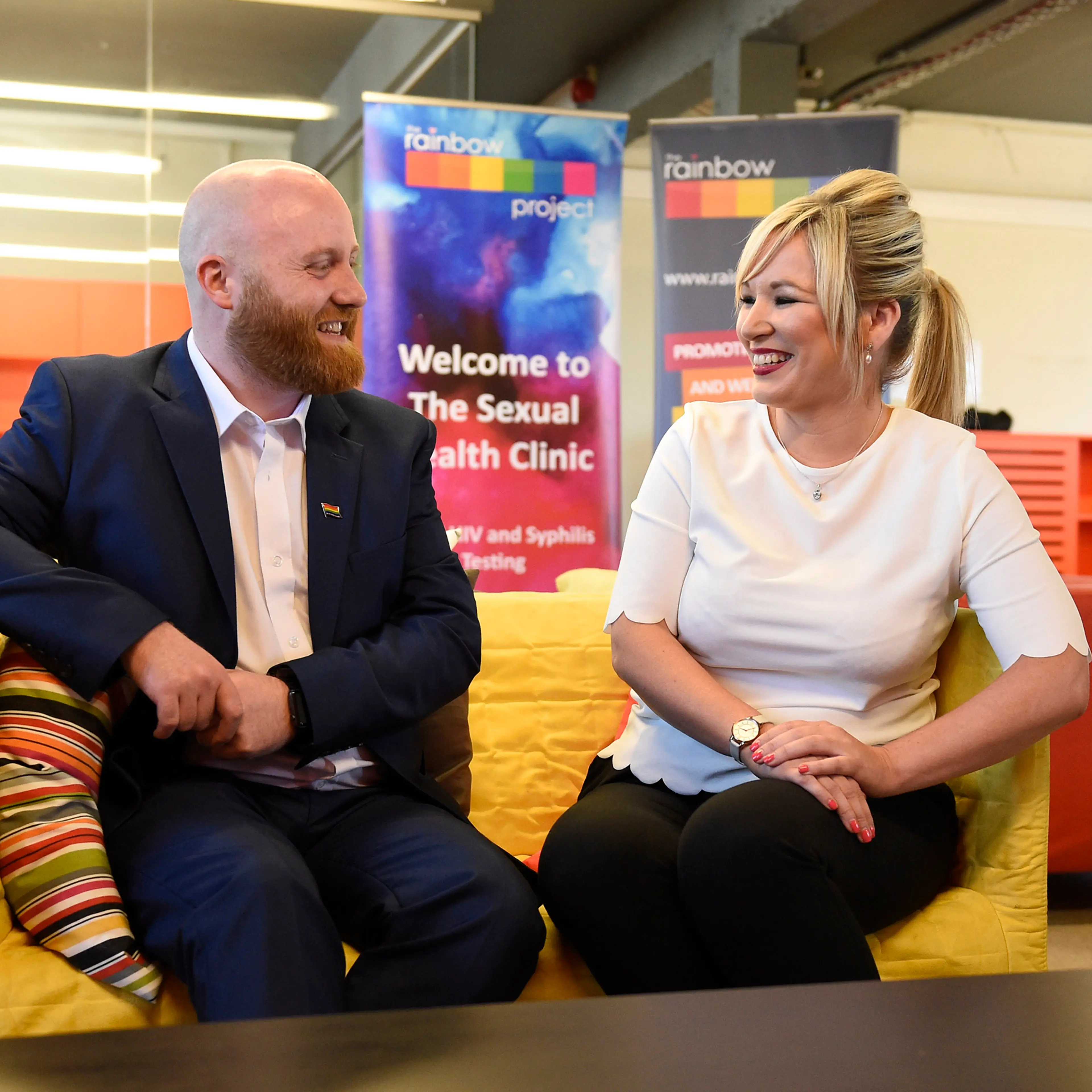 Health Minister Michelle O'Neill with John O'Doherty from The Rainbow Project which supports the LGBT community, at the organization's offices in Belfast, June 2, 2016.