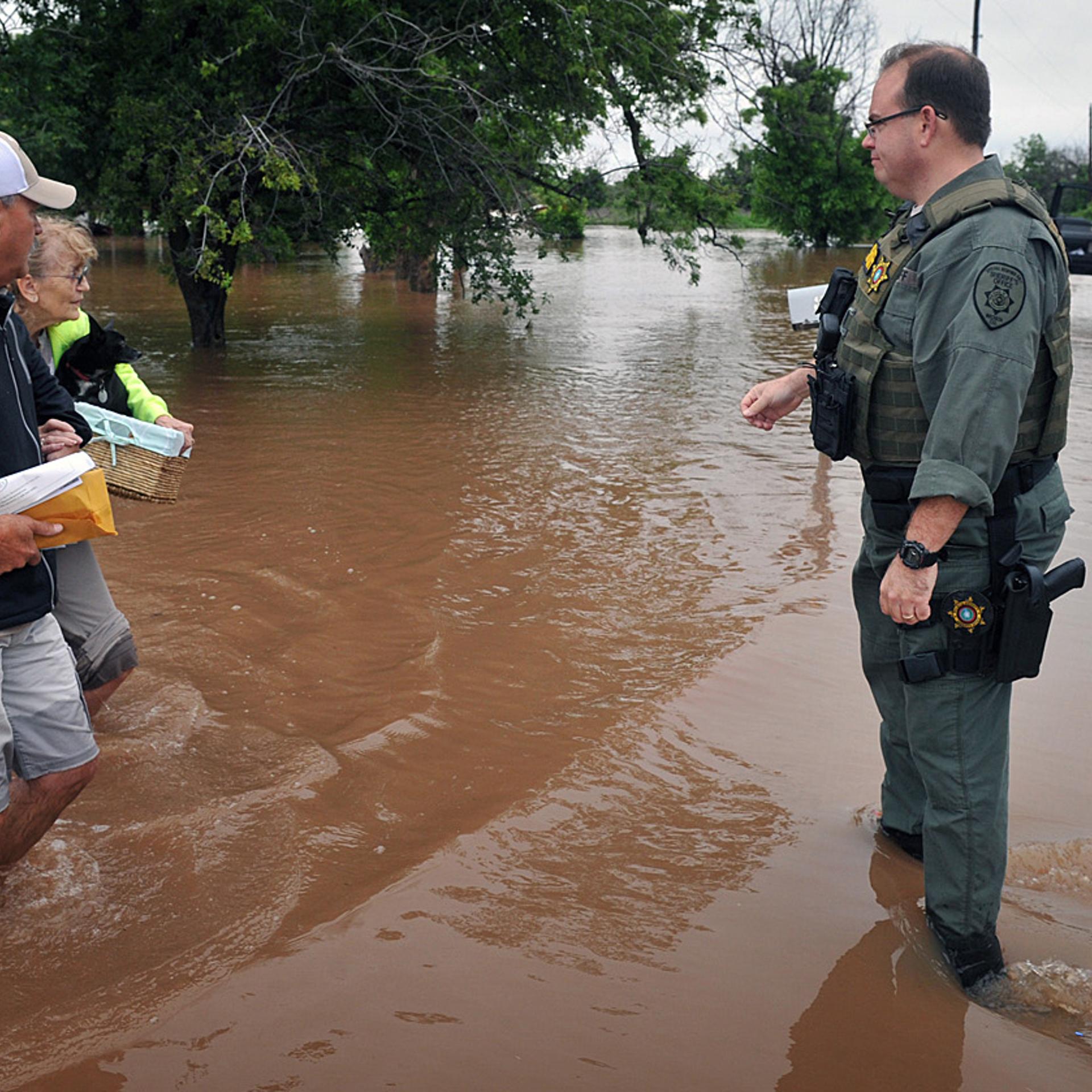 Wichita County Sheriff's deputies assisted an elderly woman after she and her pets were rescued from her home west of Wichita Falls, Texas