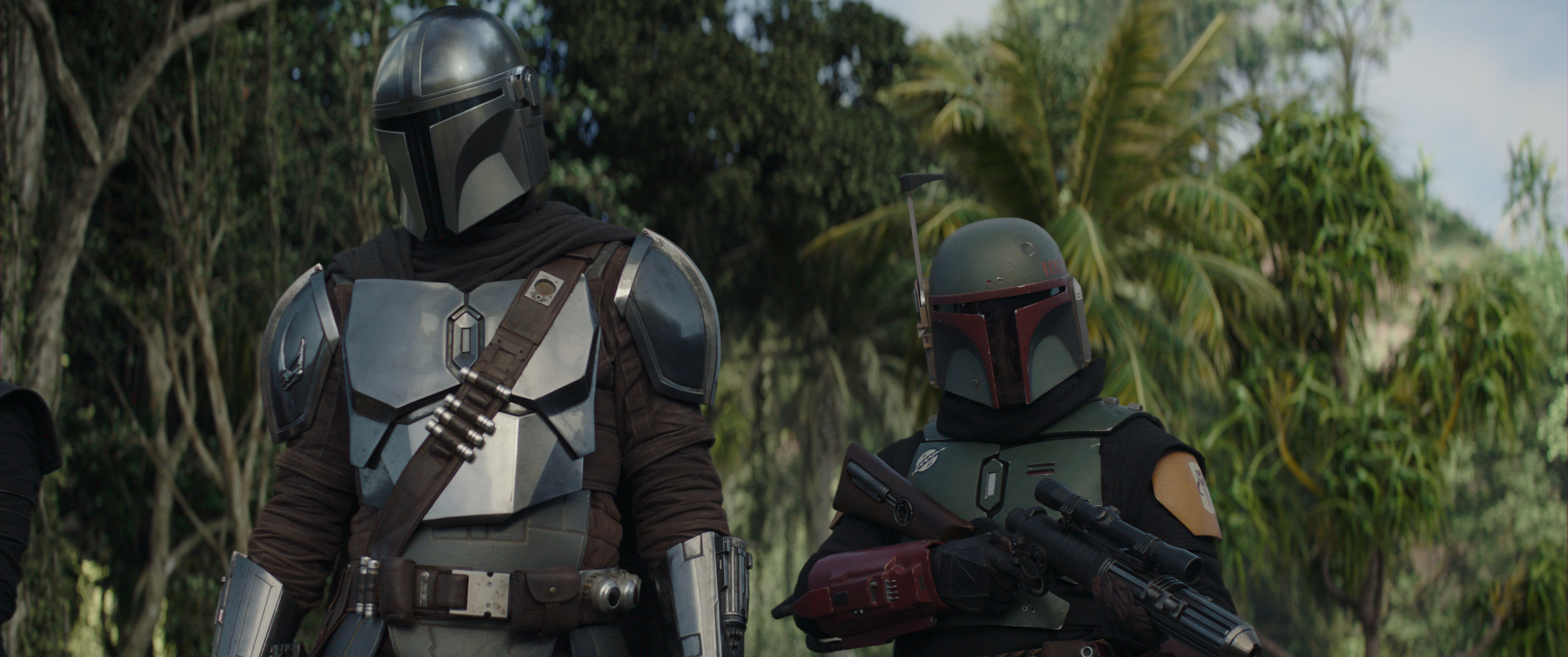 (L-R) Pedro Pascal as The Mandalorian and Temuera Morrison as Boba Fett in LucasFilm's <i>The Mandalorian</i>
