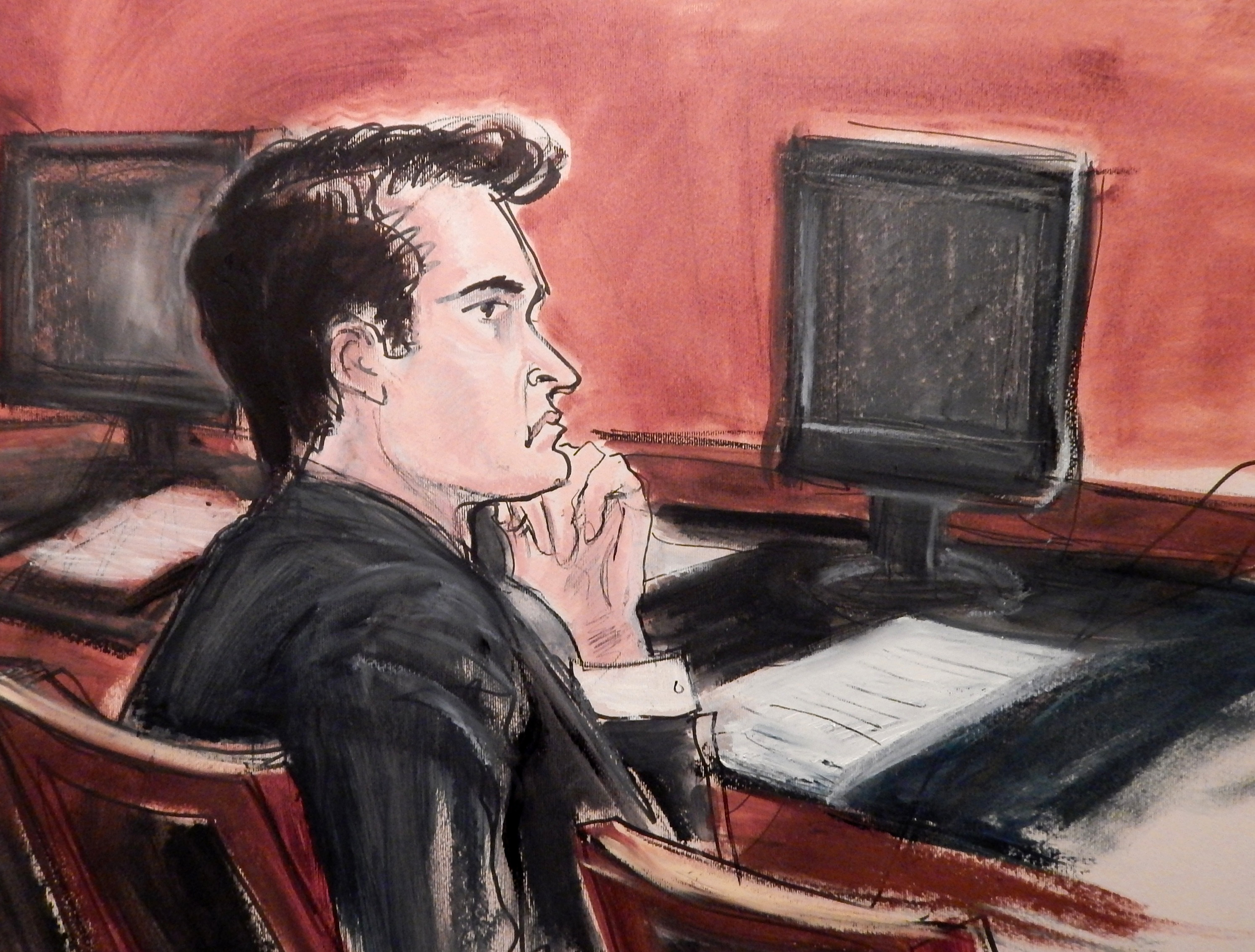In this courtroom drawing, defendant Ross William Ulbricht listens to proceedings from the defense table during opening arguments in his criminal trial in New York on Jan. 13, 2015.