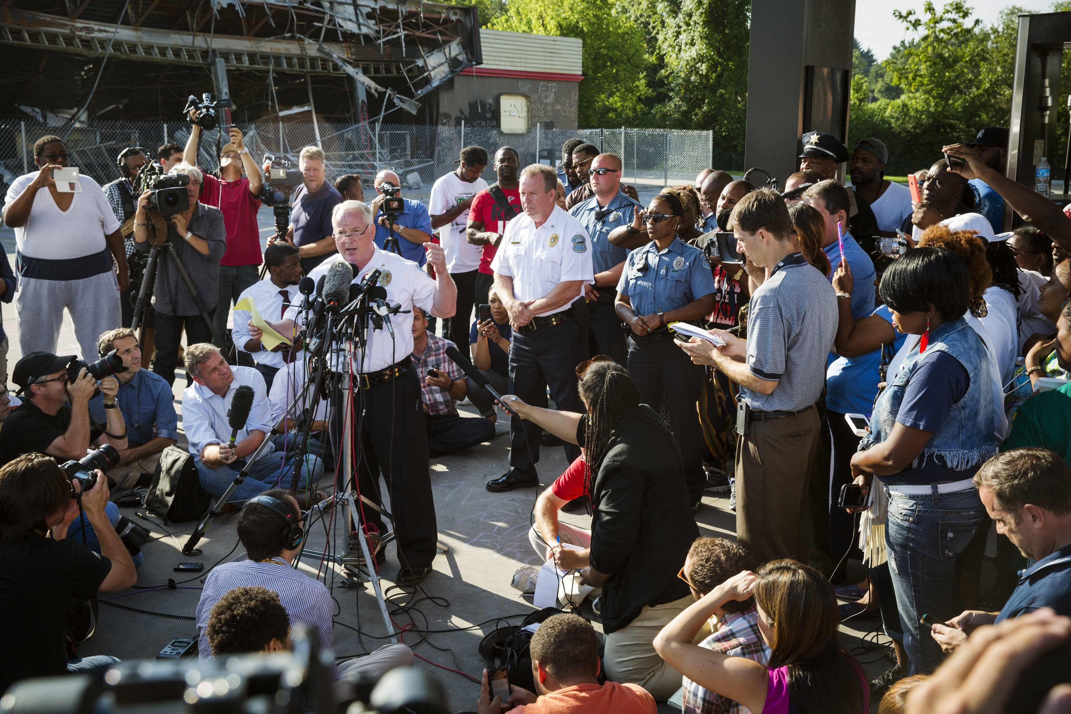 Ferguson Police Chief Thomas Jackson announces the name of the officer involved in the shooting of Michael Brown as officer Darren Wilson, in Ferguson, Missouri
