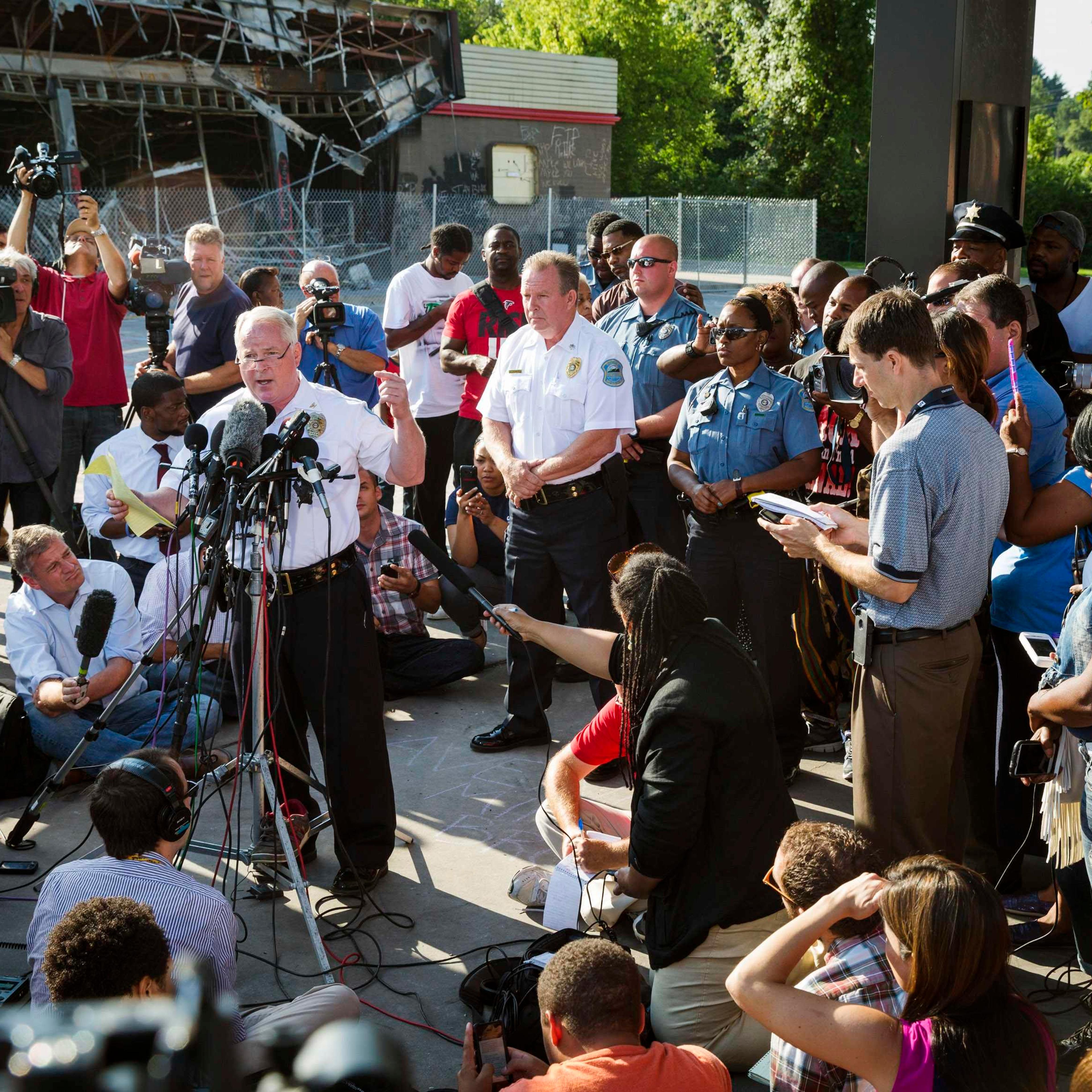 Ferguson Police Chief Thomas Jackson announces the name of the officer involved in the shooting of Michael Brown as officer Darren Wilson, in Ferguson, Missouri