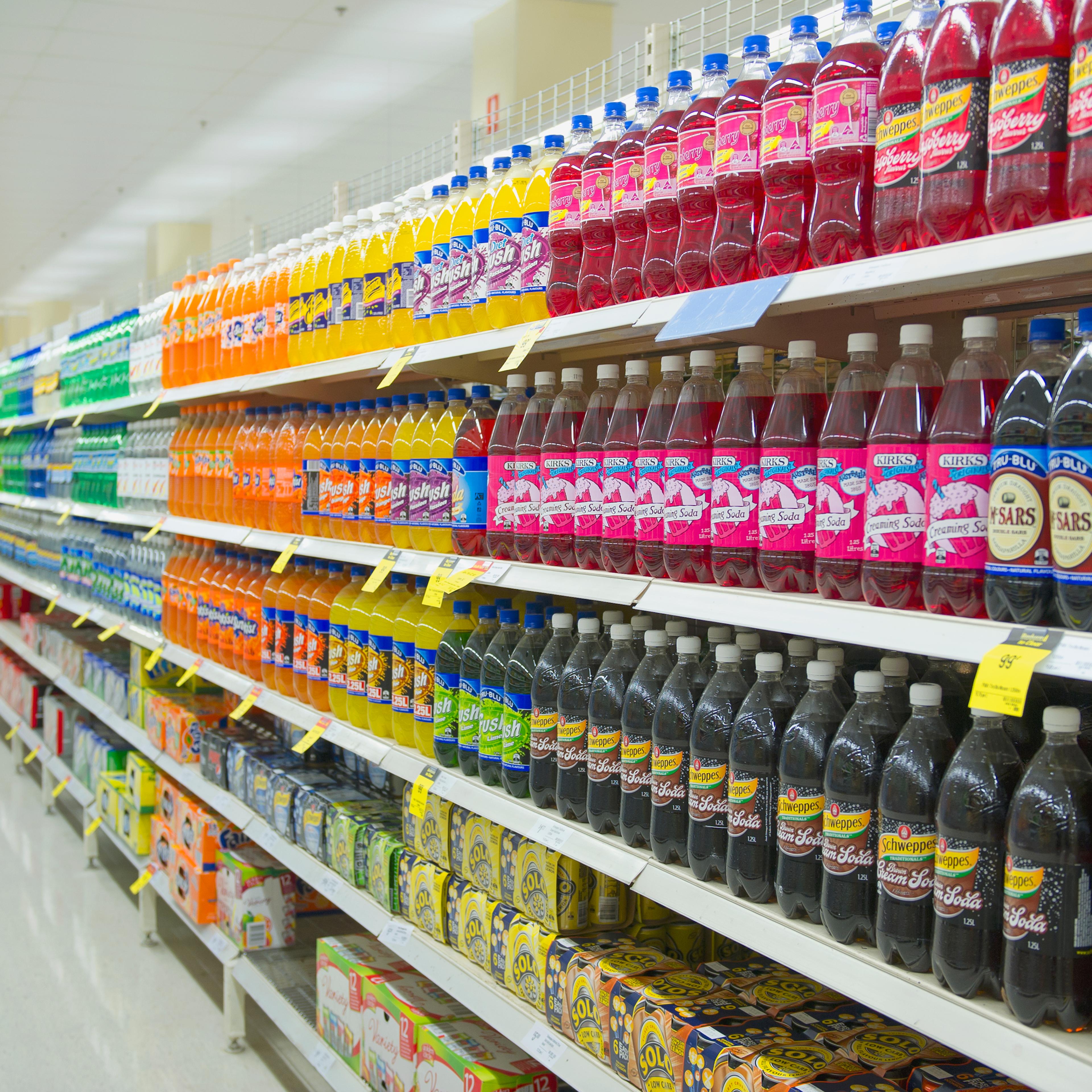 Bottled juice on supermarket shelves