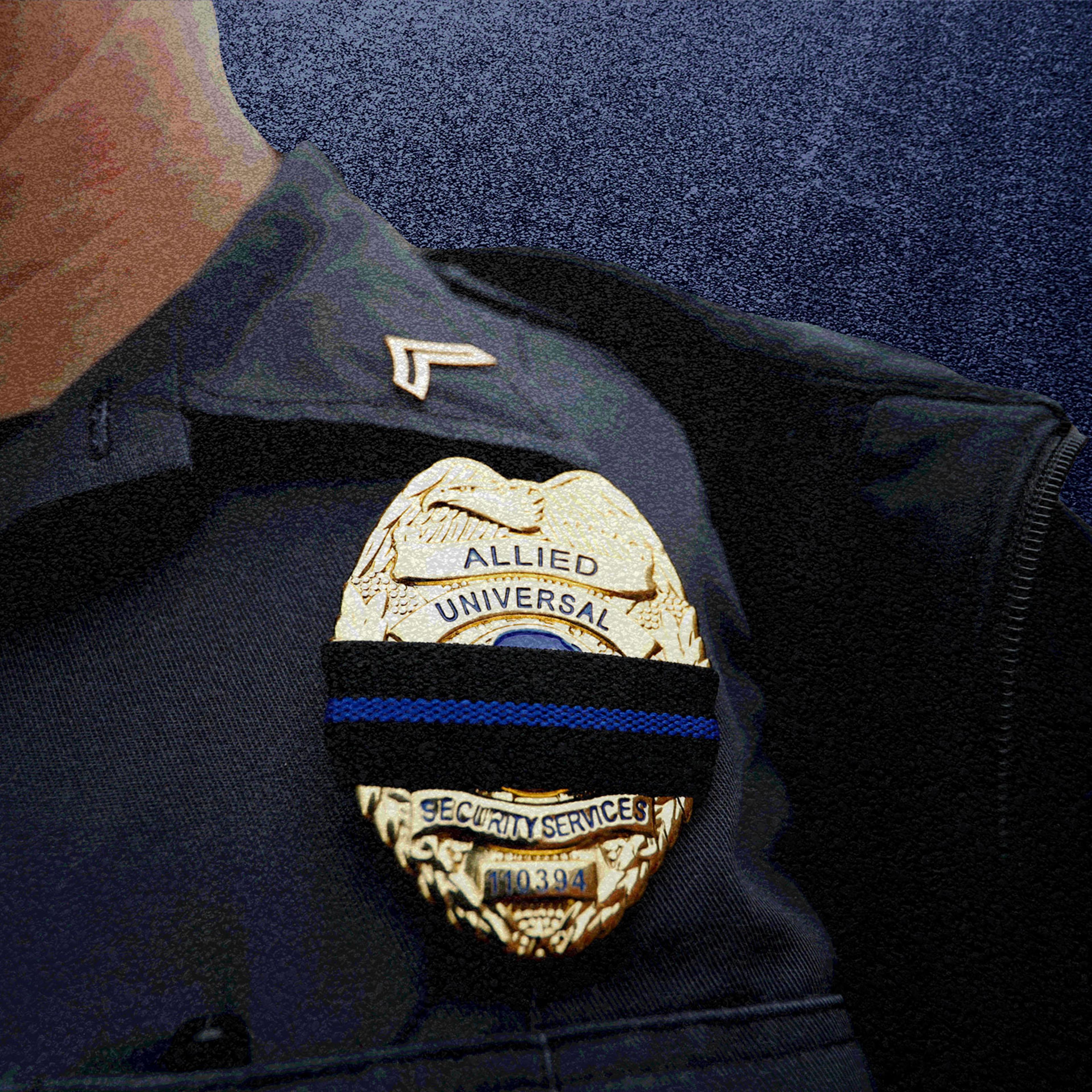 A photo-illustration showing a person in uniform with an allied universal security badge