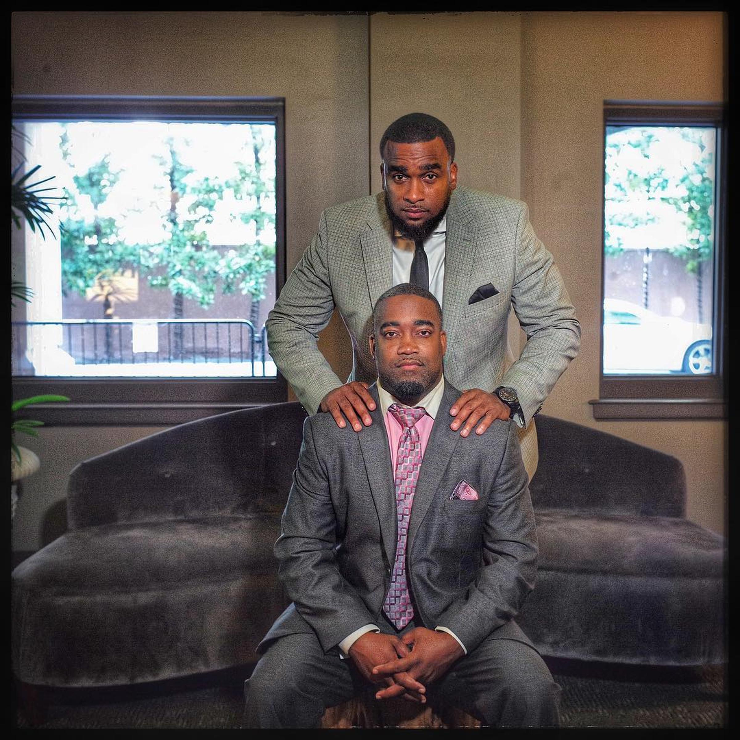 Mark Hughes is photographed with his lawyer Lee Merritt in Dallas on June 10, 2016.