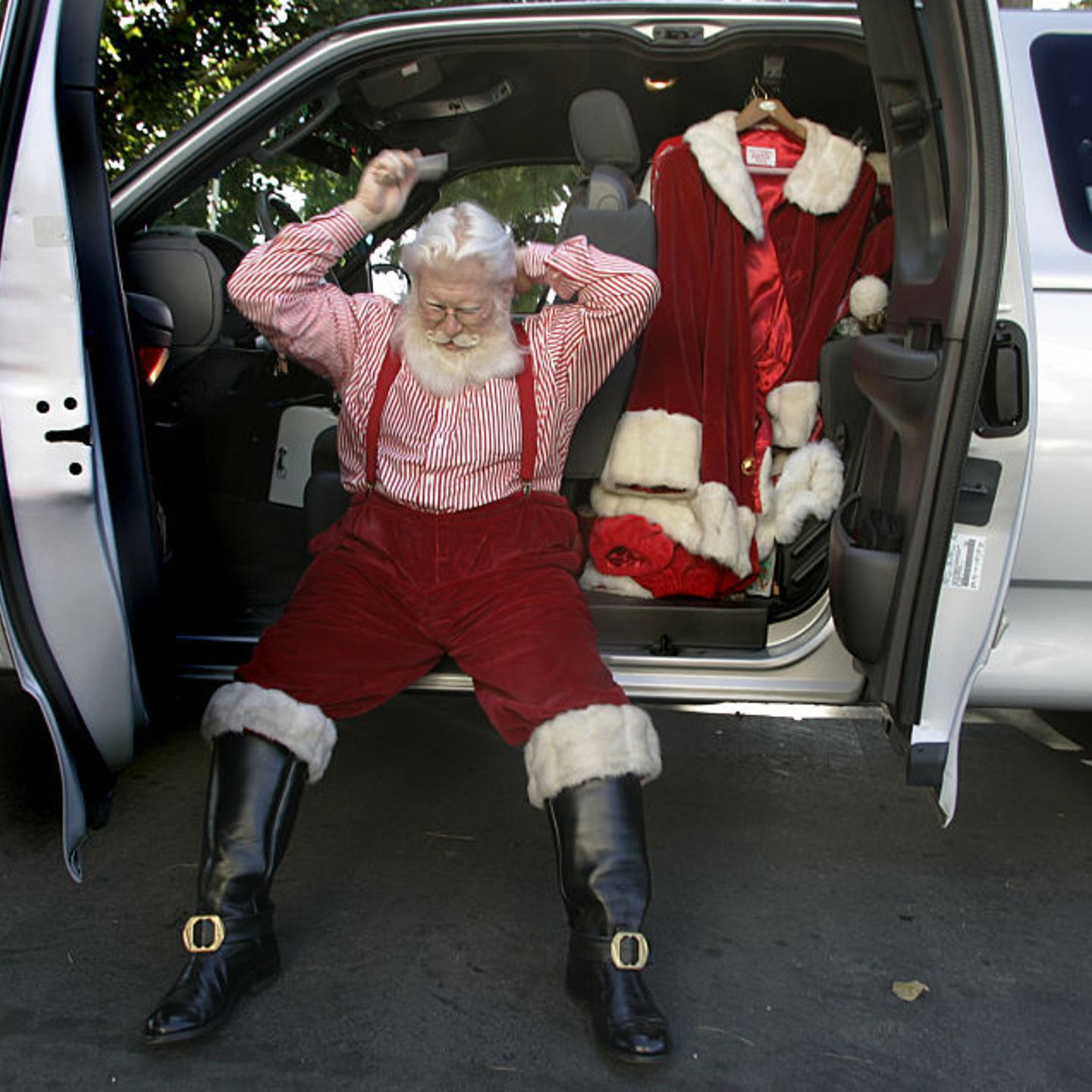 Timothy Connaghan takes off his heavy coat and combs his white hair on Dec. 21, 2004.