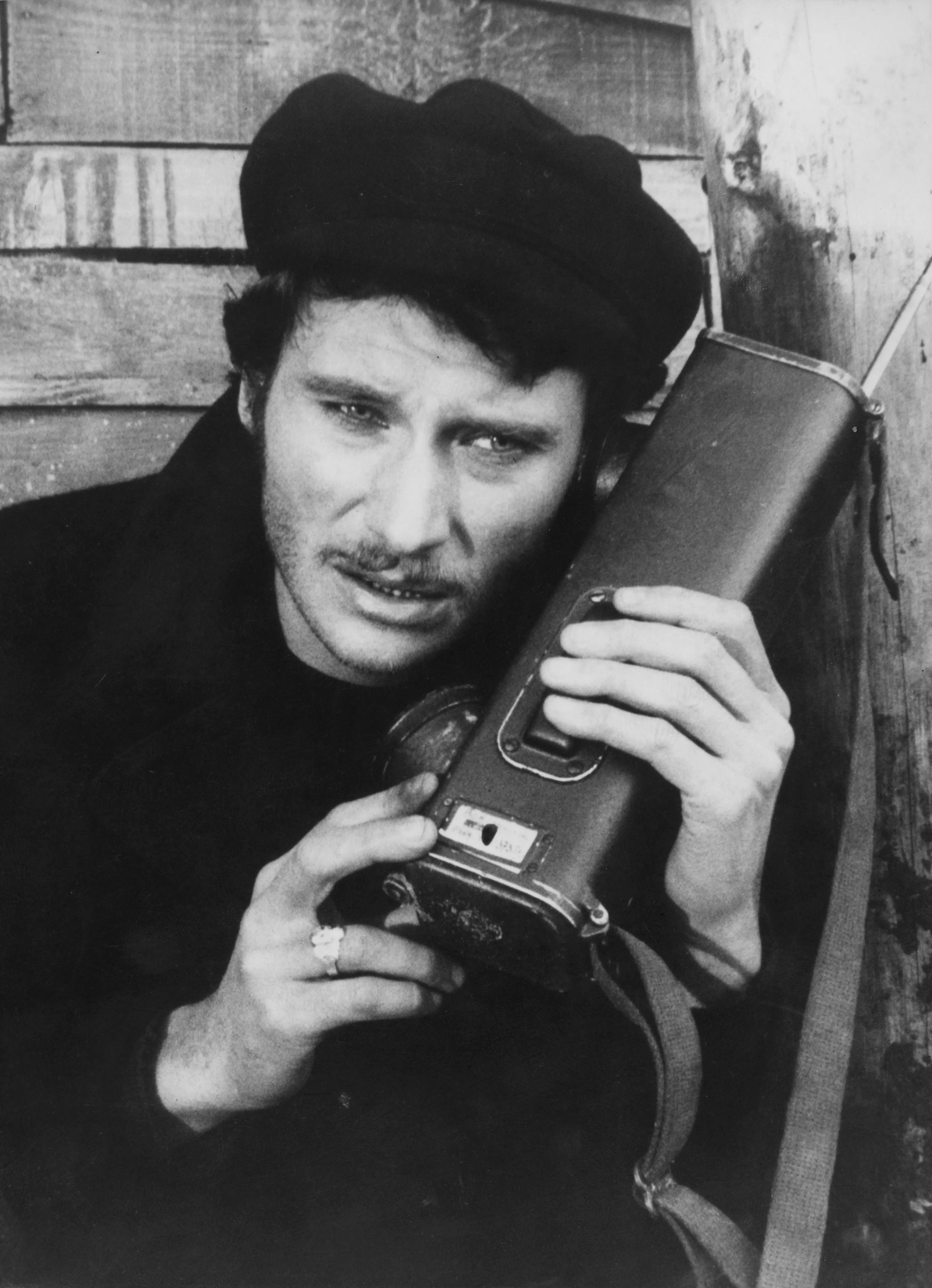 French singer and actor Johnny Hallyday in a scene from the film 'Point de Chute' (aka 'Falling Point').