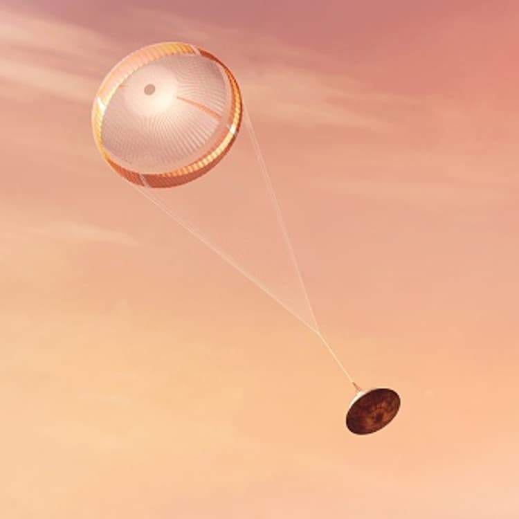 This image made available by NASA shows an illustration of NASA's Perseverance rover deploying a supersonic parachute from its aeroshell as it slows down before landing. NASA's Perseverance rover touched down safely on Mars on Feb. 18, 2021.