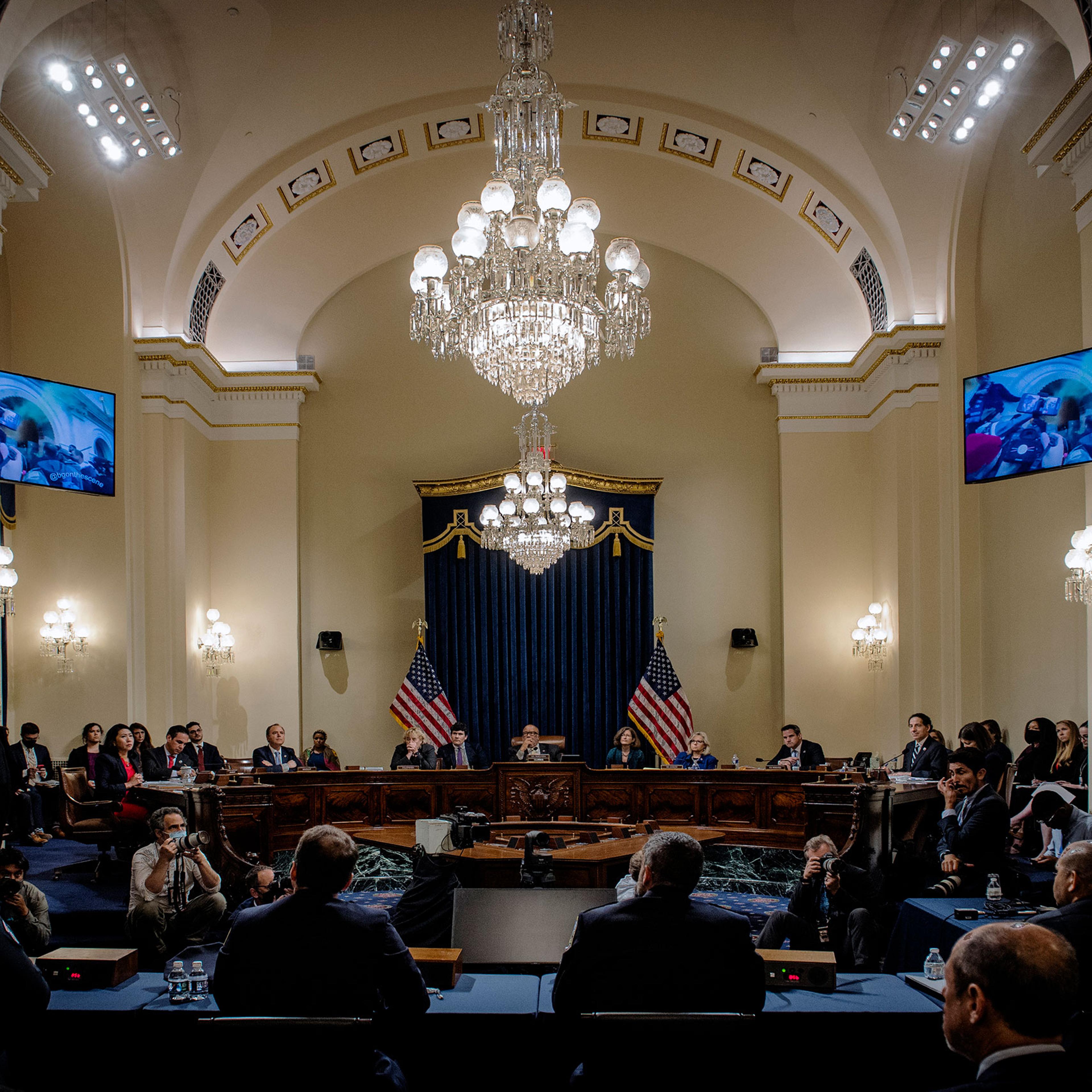 All eyes are on the video monitors to witness clips of the confrontations as the Congressional Jan 6th commission hearing begins, in Washington, on July 27, 2021.