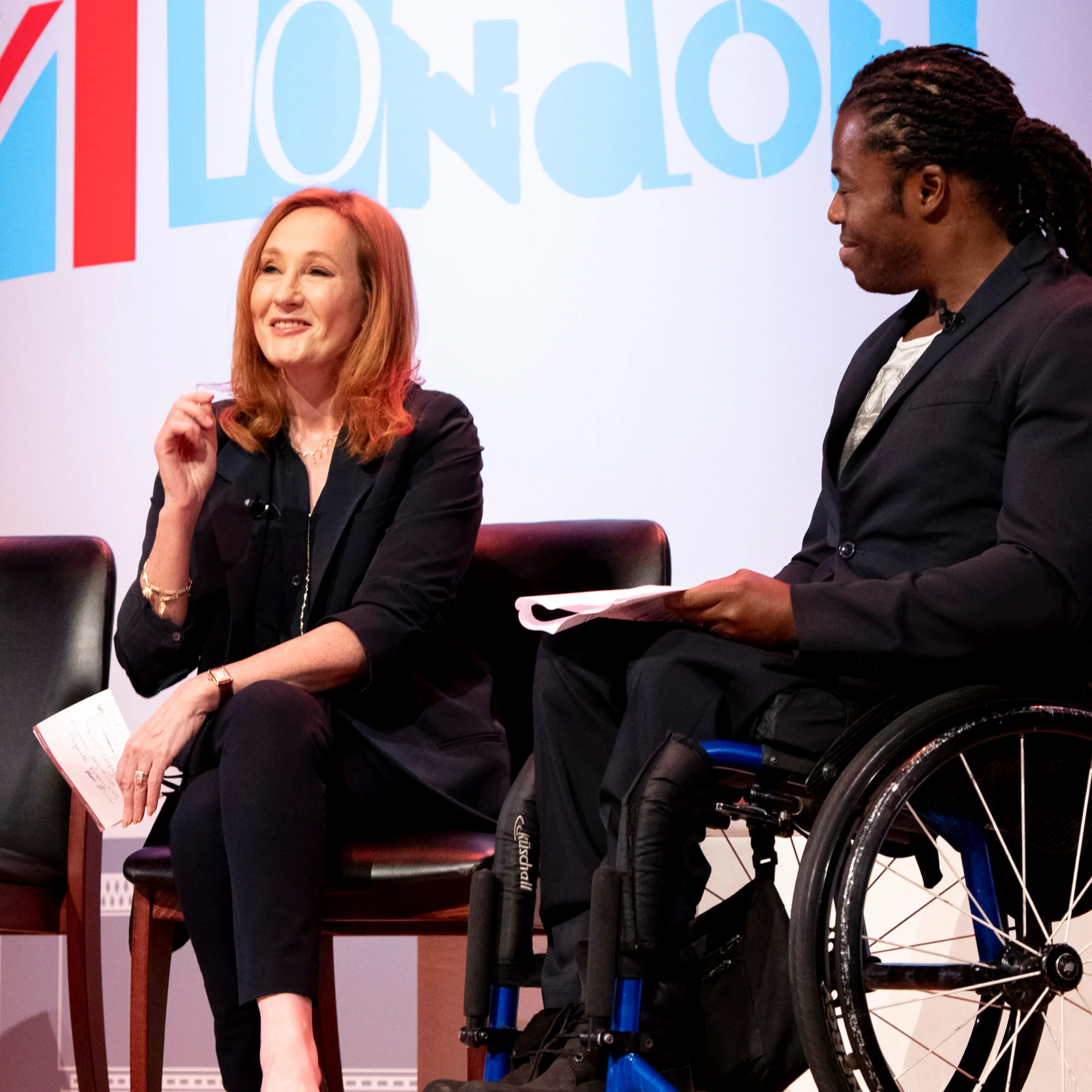 The author J.K. Rowling alongside U.K. paralympian Ade Adepitan at the One Young World global forum in London on Oct. 24
