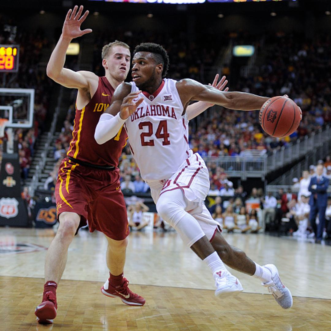 Buddy Hield (#24) of Oklahoma drives to the basket against Iowa State during the quarterfinals of the Big 12 Basketball Tournament in Kansas City, Missouri on March 10, 2016.