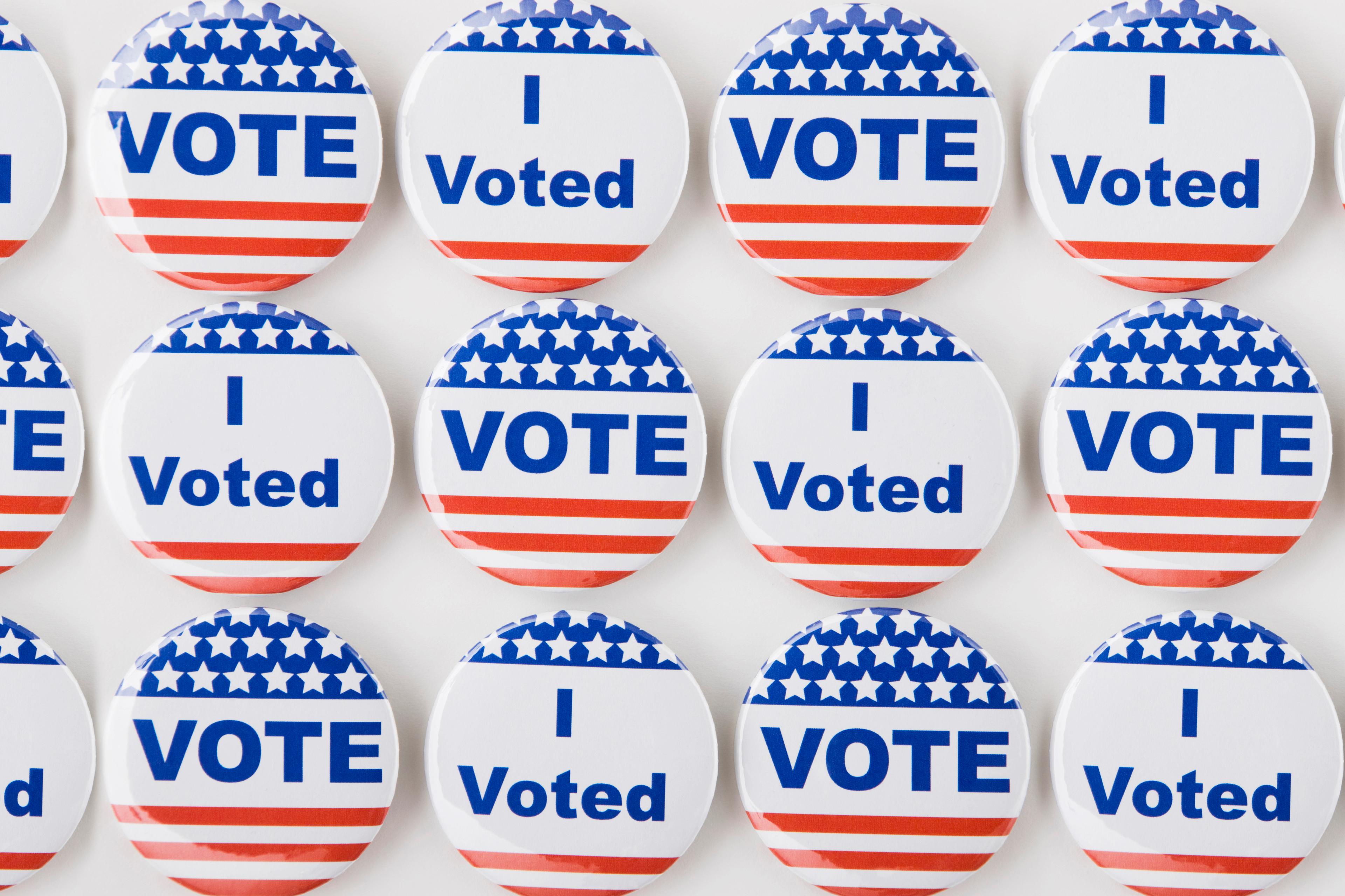 Rows of American vote buttons