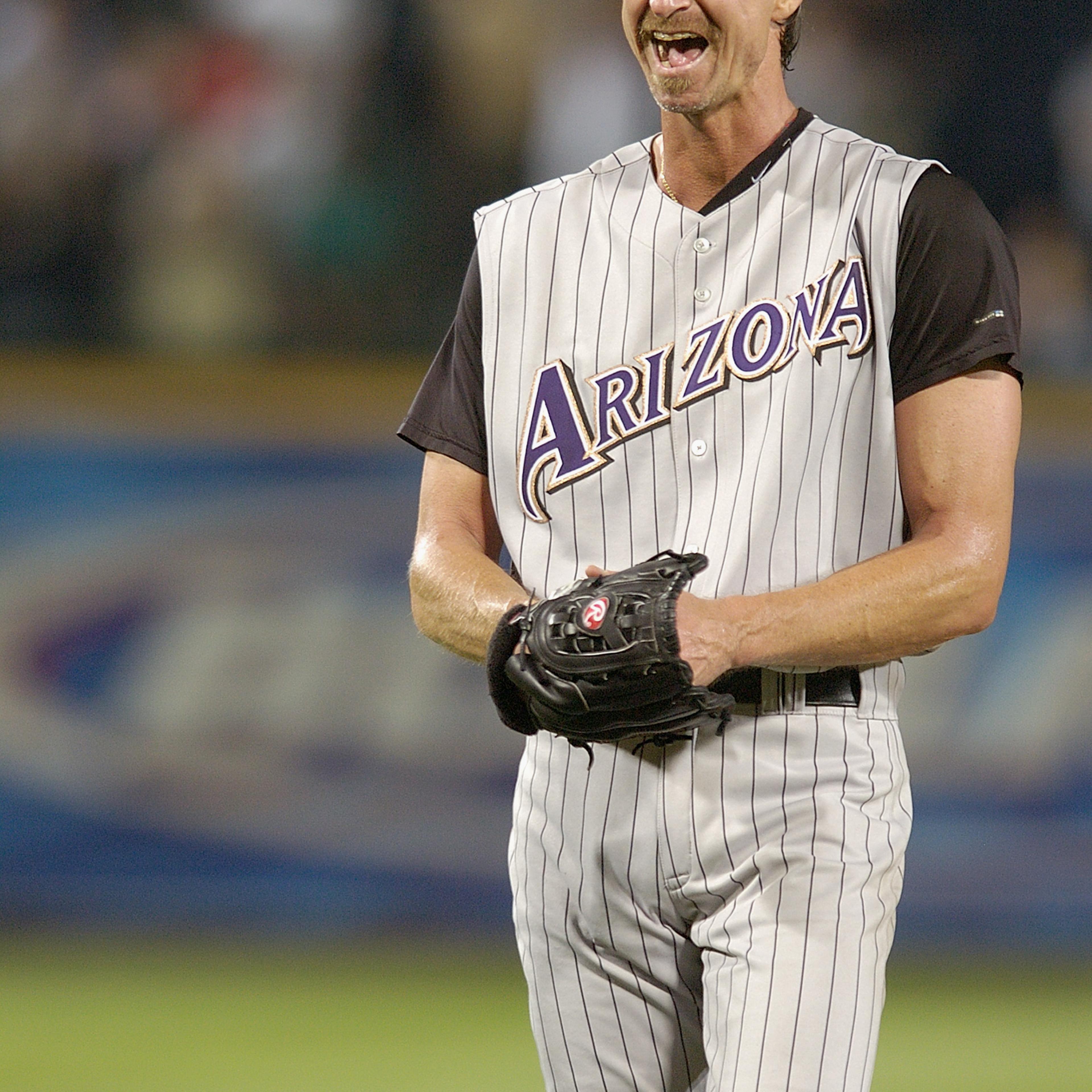 Randy Johnson smiles after pitching a perfect game between the Arizona Diamondbacks and the Atlanta Braves at Turner Field in Atlanta on May 18, 2004.