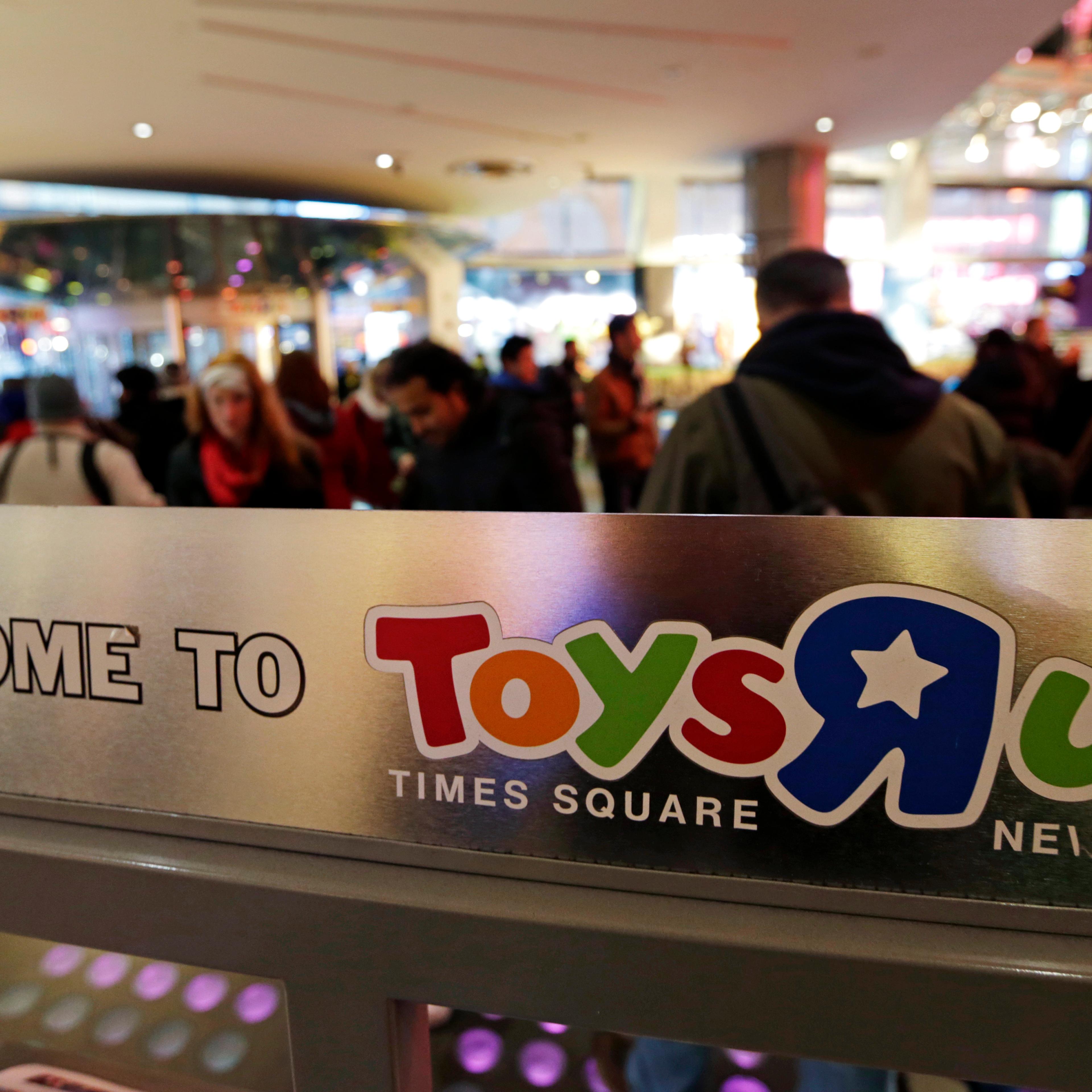 The Toys R Us Inc. logo is displayed inside a store ahead of Black Friday in New York, U.S., on Thursday, Nov. 27, 2014