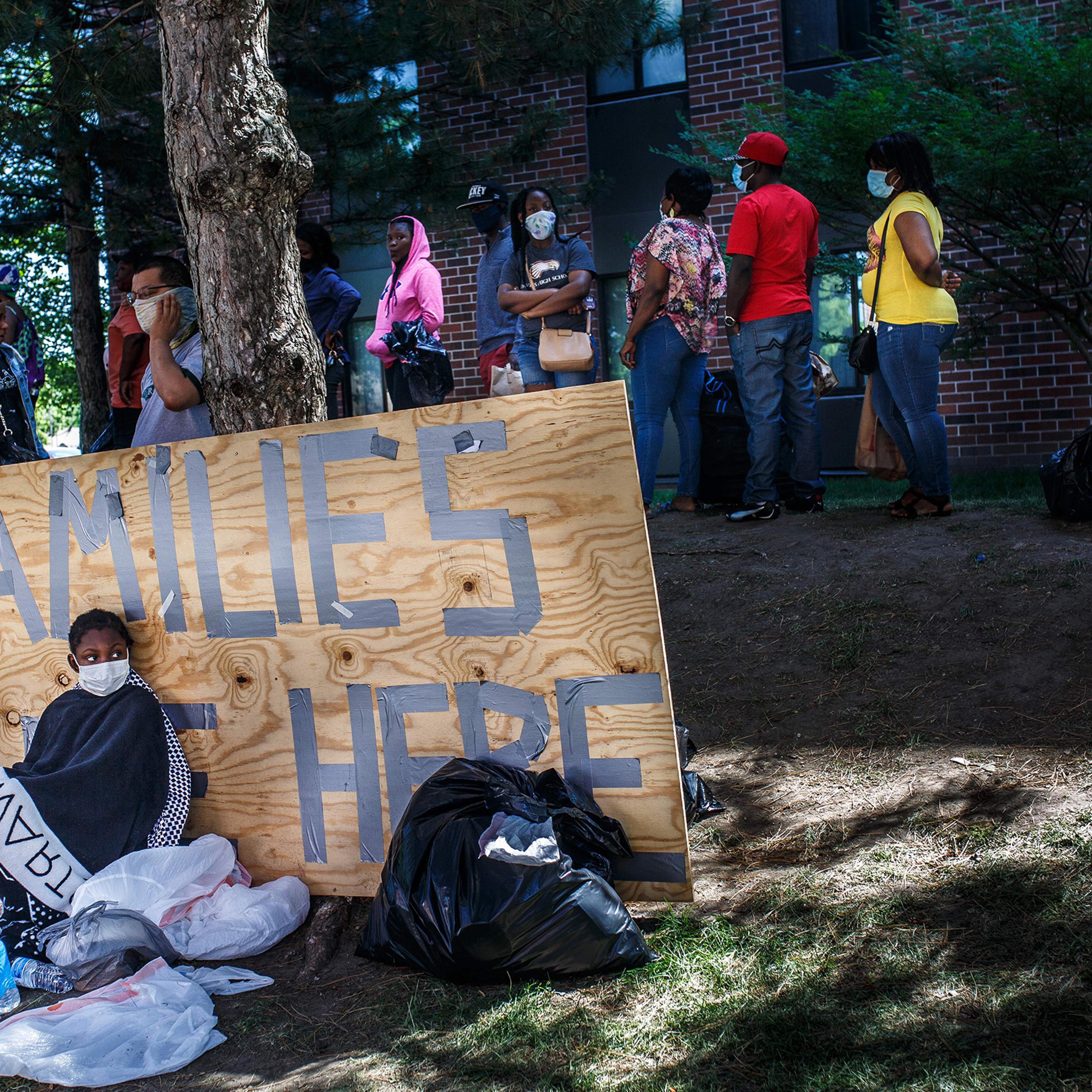 People line up for food at Holy Trinity English Lutheran Church on June 5 in Minneapolis following the demonstrations triggered by the death of George Floyd