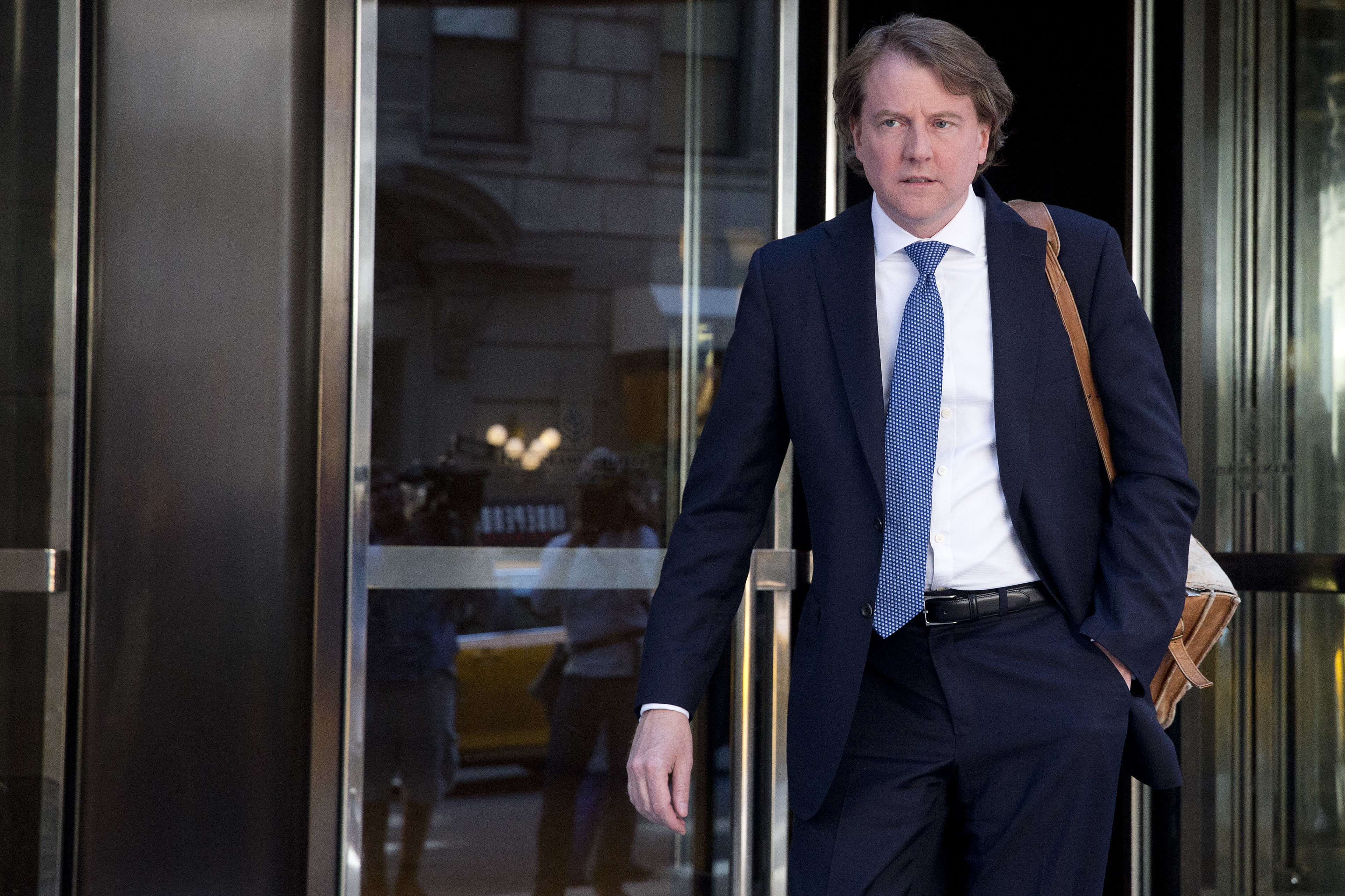 Attorney Donald McGahn leaves the Four Seasons hotel in New York, June 9, 2016, after a GOP fundraiser.