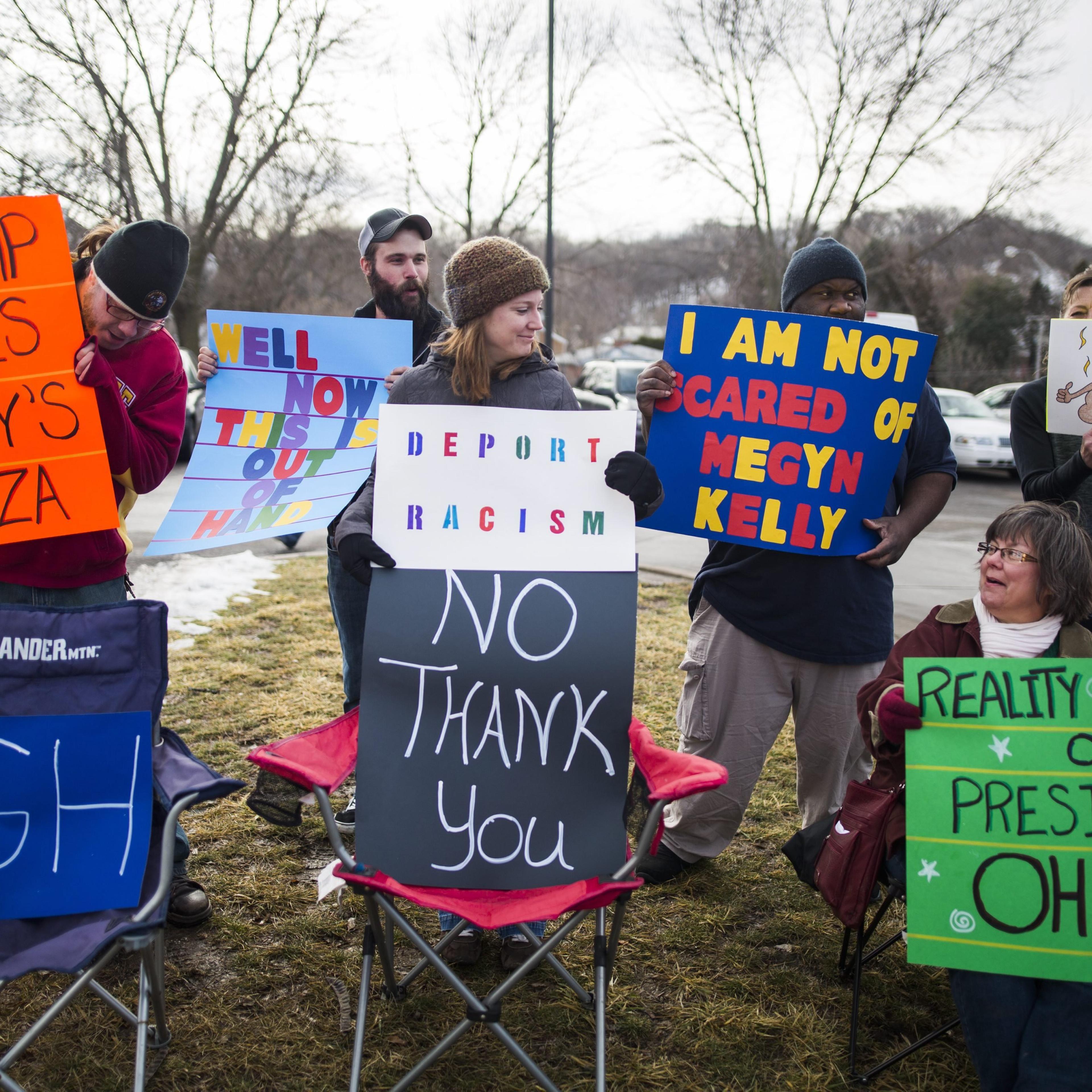 Protestors gather outside a campaign event for Republican presidential candidate Donald Trump at the Gerald Kirn Middle School in Council Bluffs, Iowa on Jan. 31 2016.