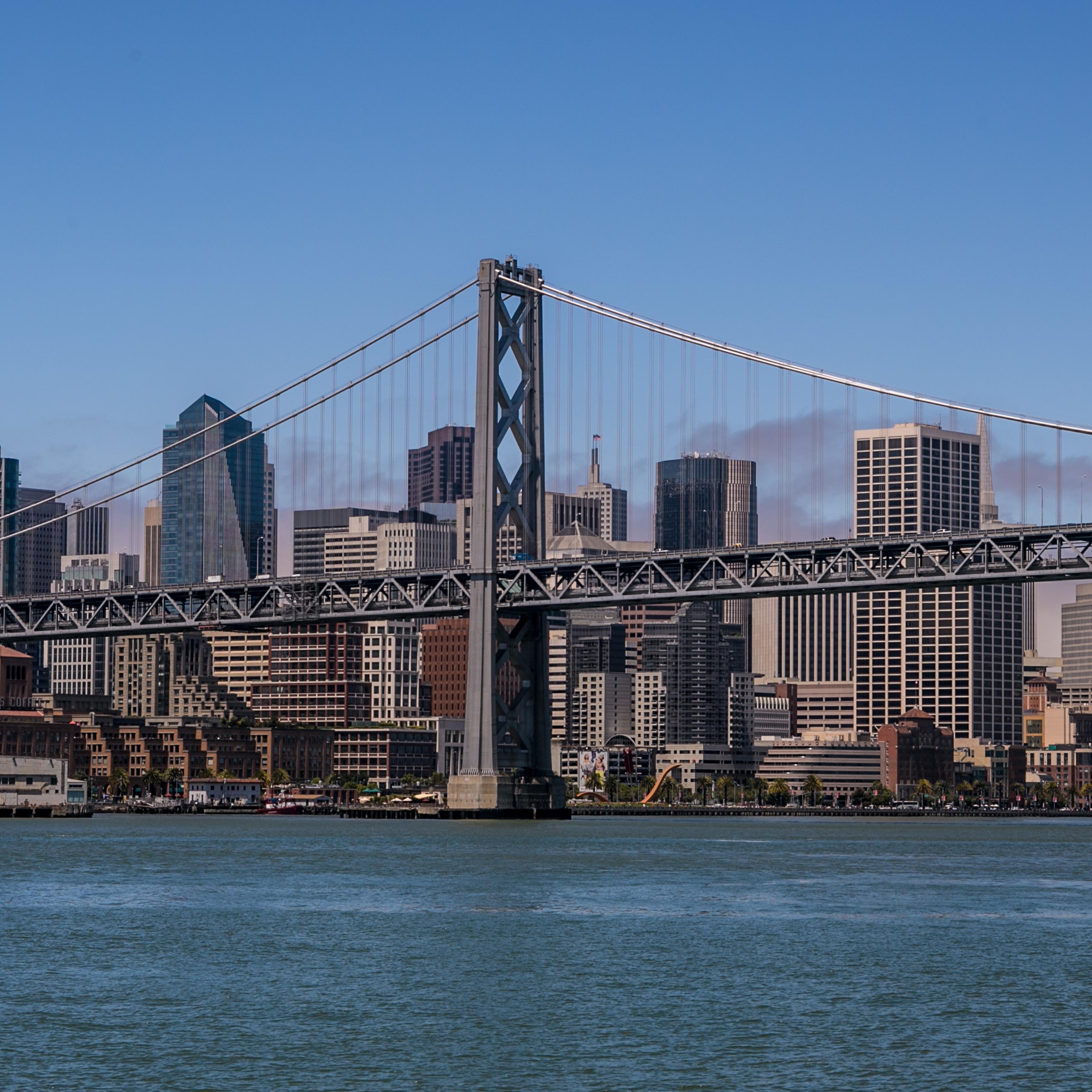 The downtown San Francisco skyline and Bay Bridge are shown during a 30-minute ferry ride across to AT&T Park on July 10, 2013, in San Francisco.