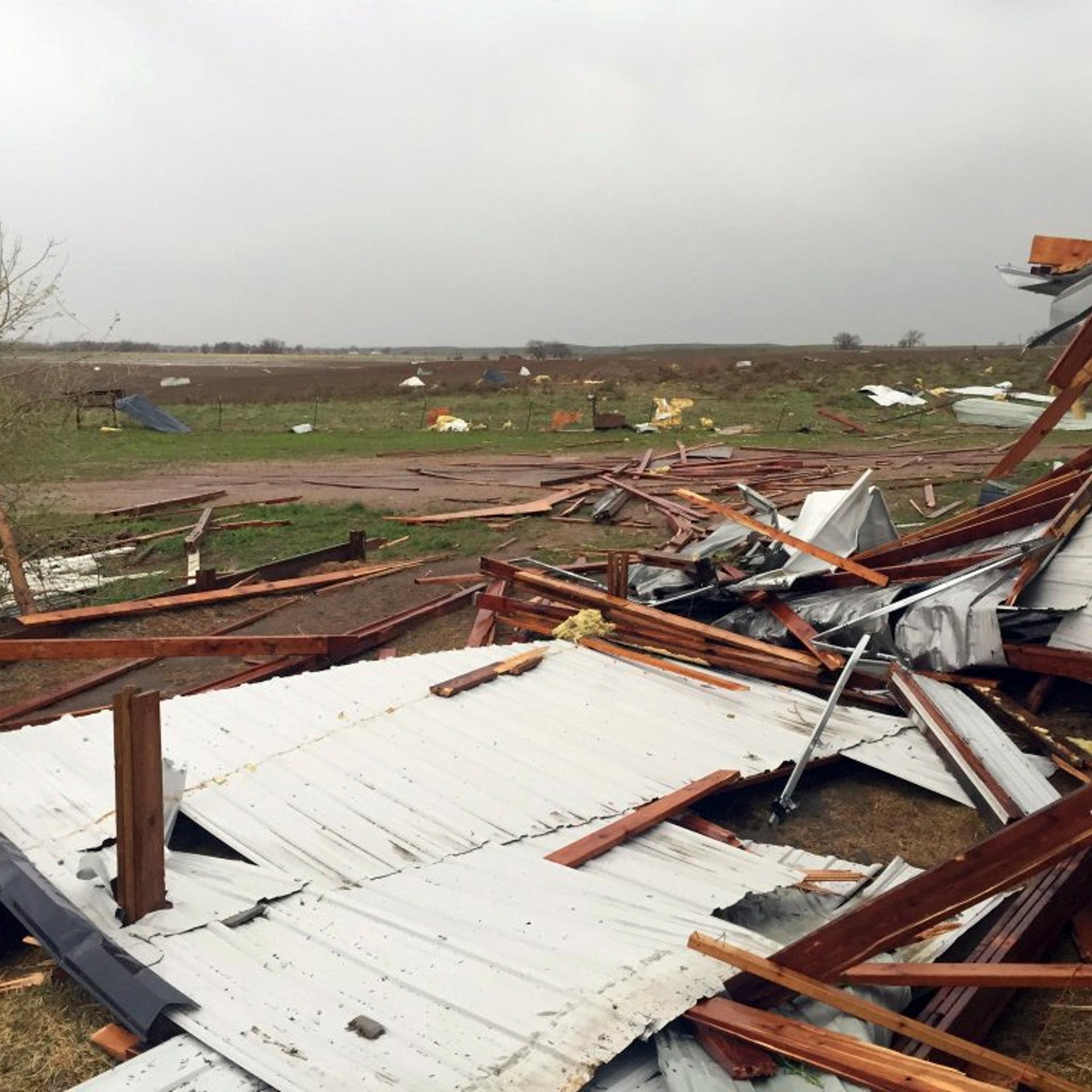 Debris lies scattered on the ground after a tornado was reported in Weld County outside Wiggins, Colo., May 7, 2016. Spring storms menaced parts of the West on Saturday, bringing hail and a tornado sighting in Colorado and deadly driving conditions in Ar