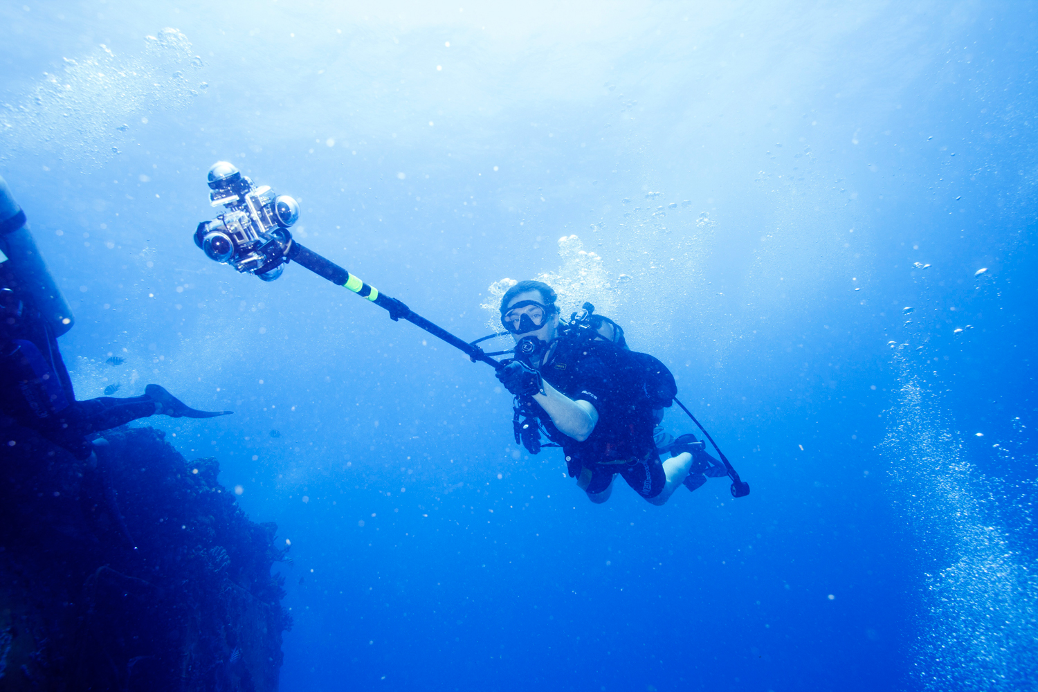 TIME Senior Editor Jonathan D. Woods is seen holding a 360Heros scuba rig as he shoots a 360 video of Aquarius Reef Base on June 15, 2014.