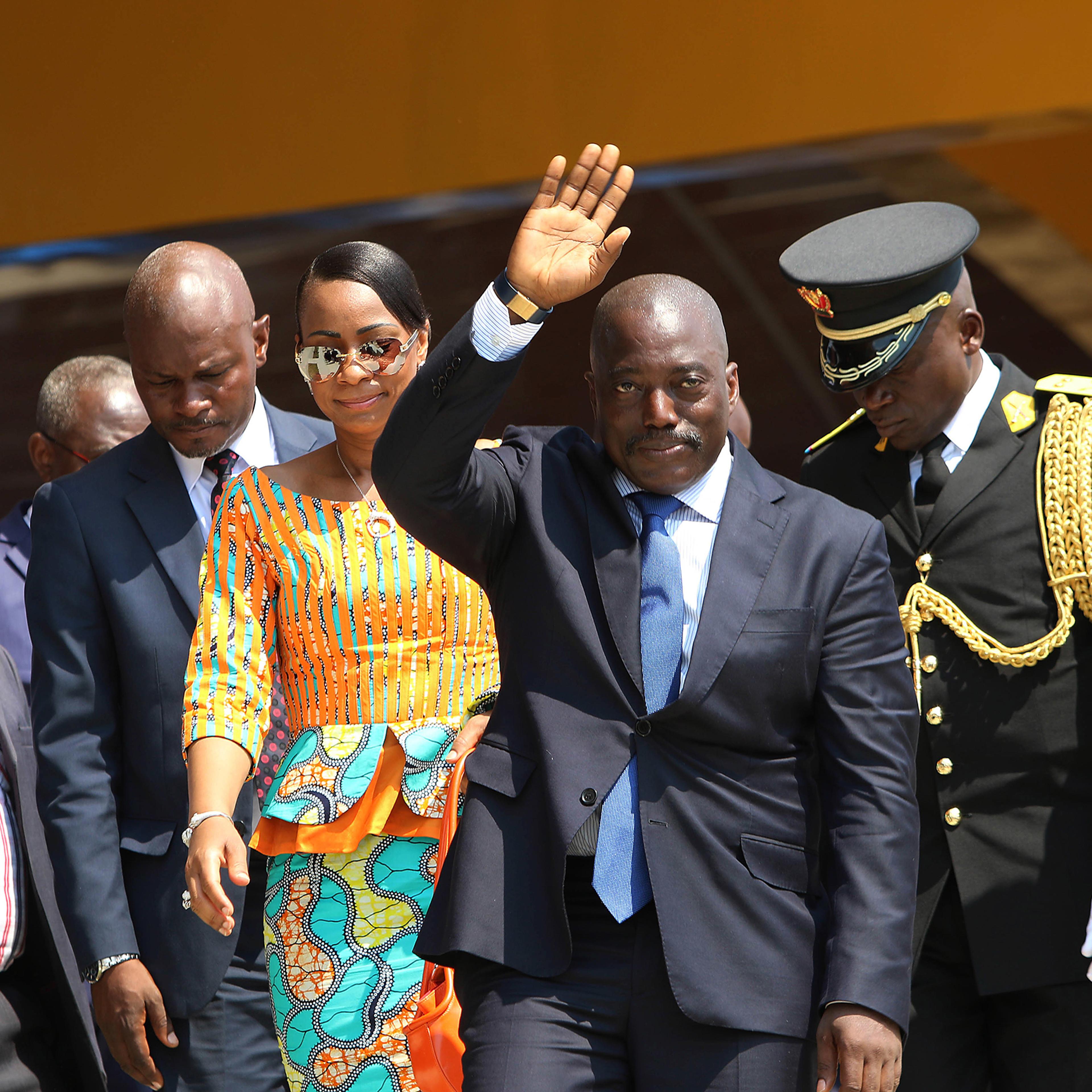 Congolese President Joseph Kabila waves as he and others celebrate the Democratic Republic of Congo, DRC, independence in Kindu, Congo on June 30, 2016.