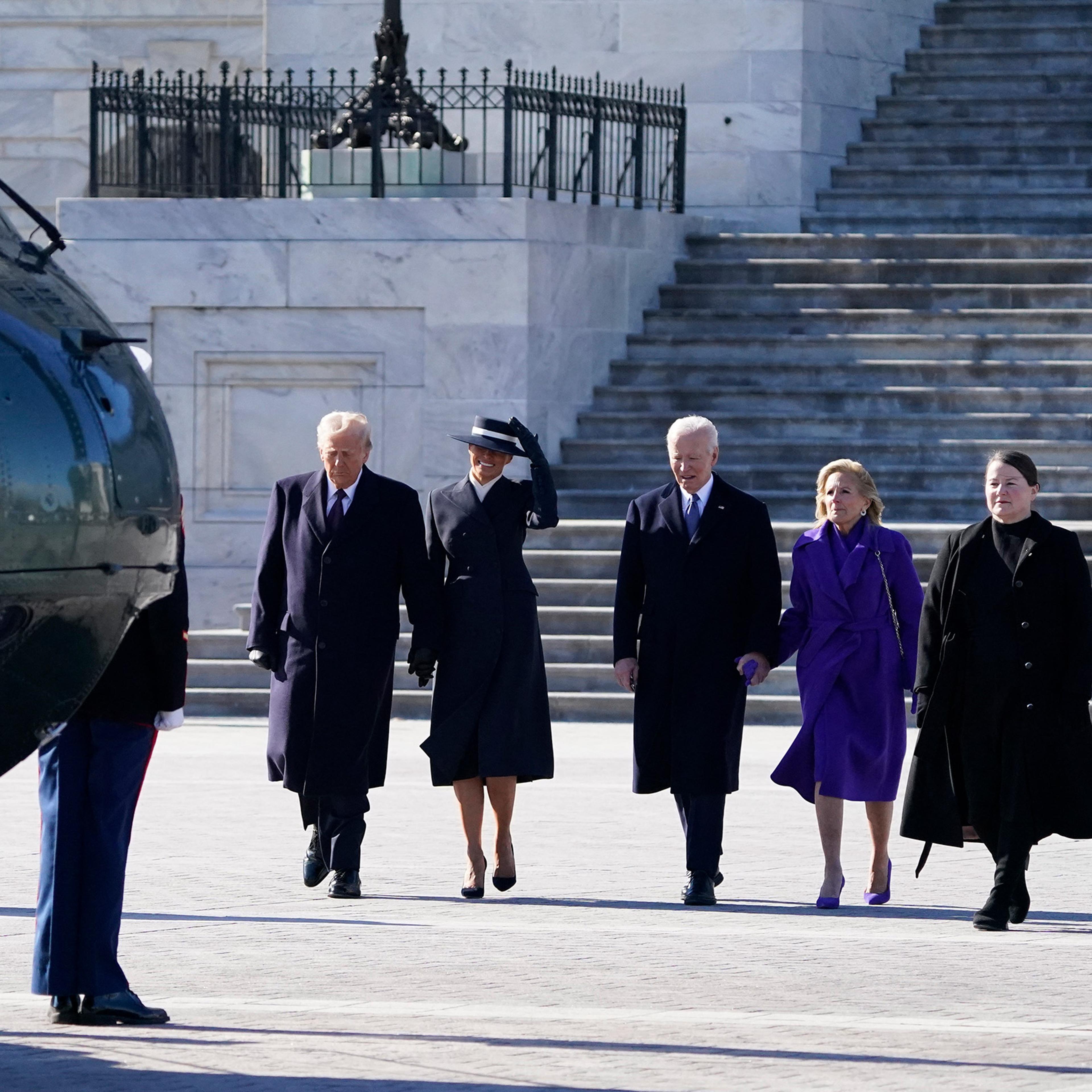 U.S. President Donald Trump and U.S. first lady Melania Trump walk from the U.S. Capitol building with Former U.S. President Joe Biden and Former U.S. first lady Jill Biden as they board Marine One on the inauguration day of Donald Trump's second presidential term in Washington, U.S. Jan. 20, 2025.