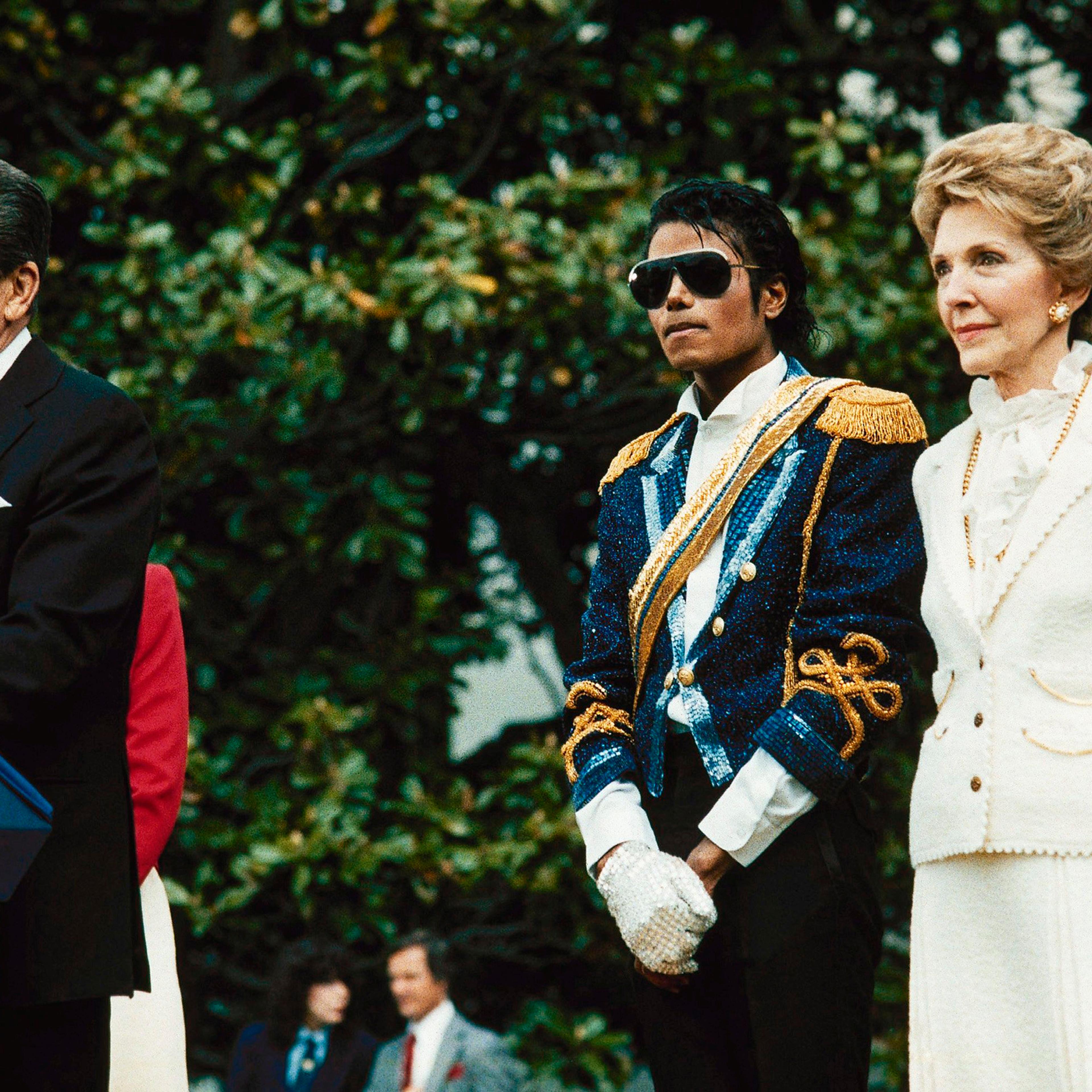 Michael Jackson stands with former President Ronald Reagan and first lady Nancy Reagan on the south lawn of the White House prior to receiving an award from the president for his contribution to the drunk driving awareness program in Washington, DC on Ma