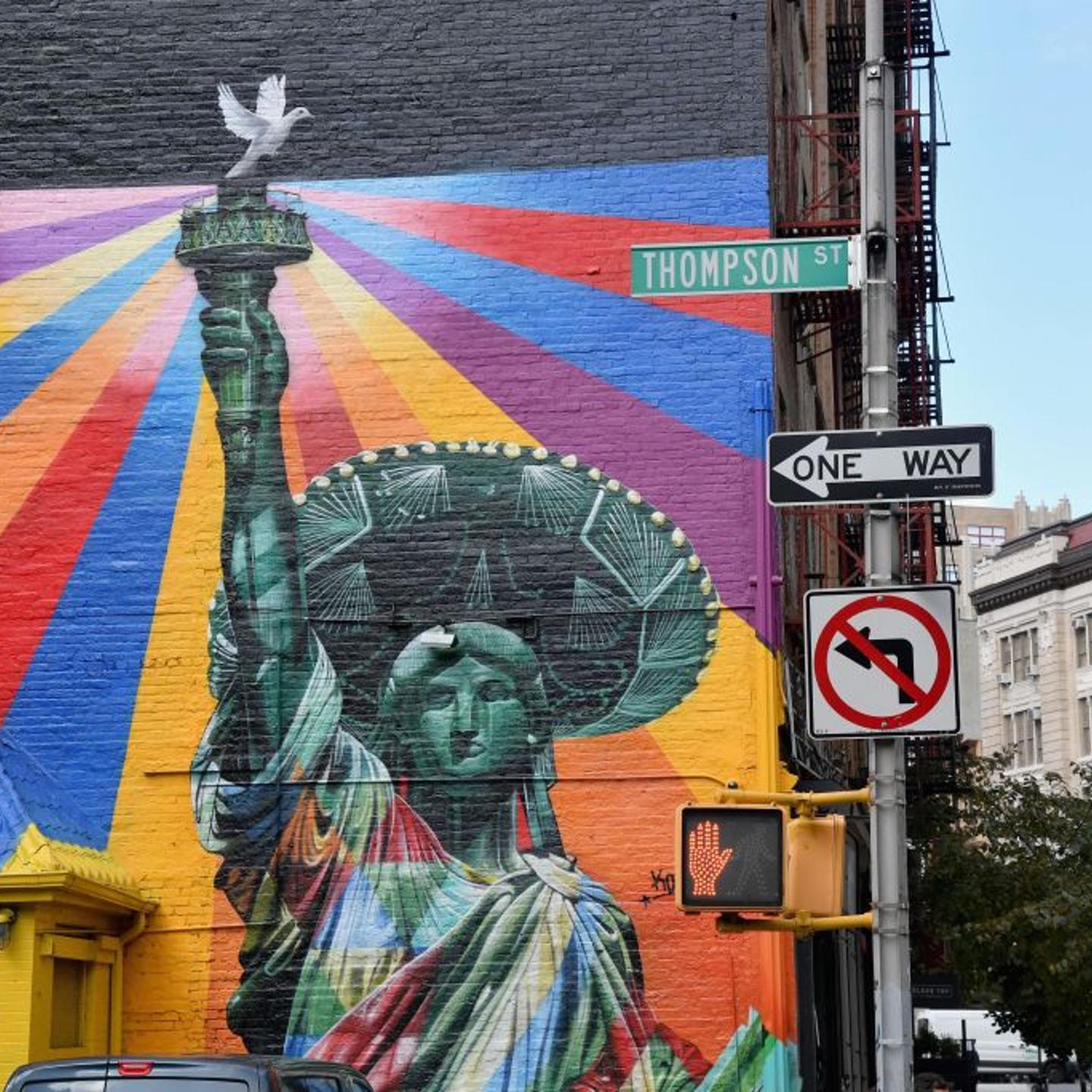 TOPSHOT-US-ART-IMMIGRATION-MURAL