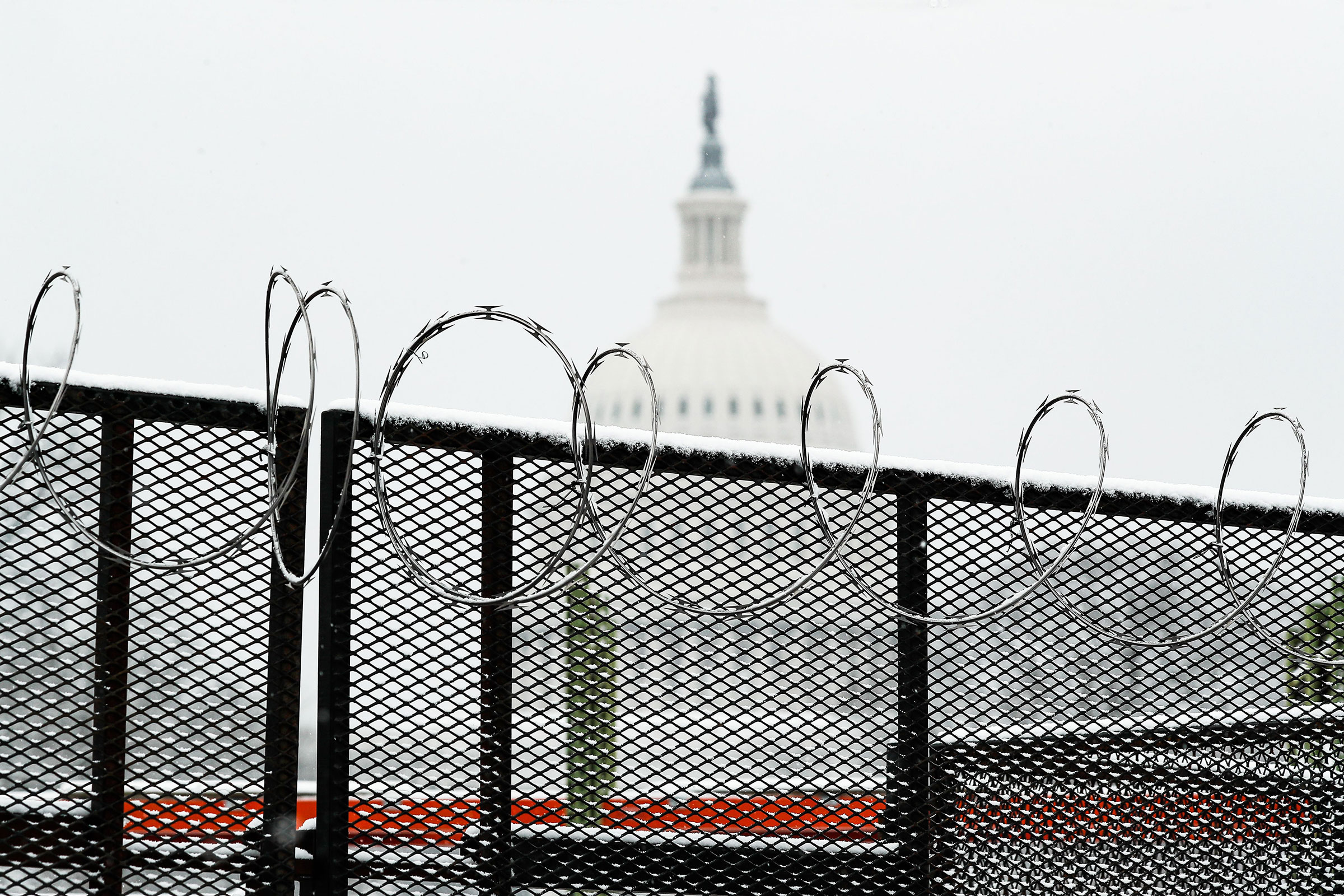 Snow-covered wire on the security fence around the Capitol in Washington, on Jan. 31, 2021.
