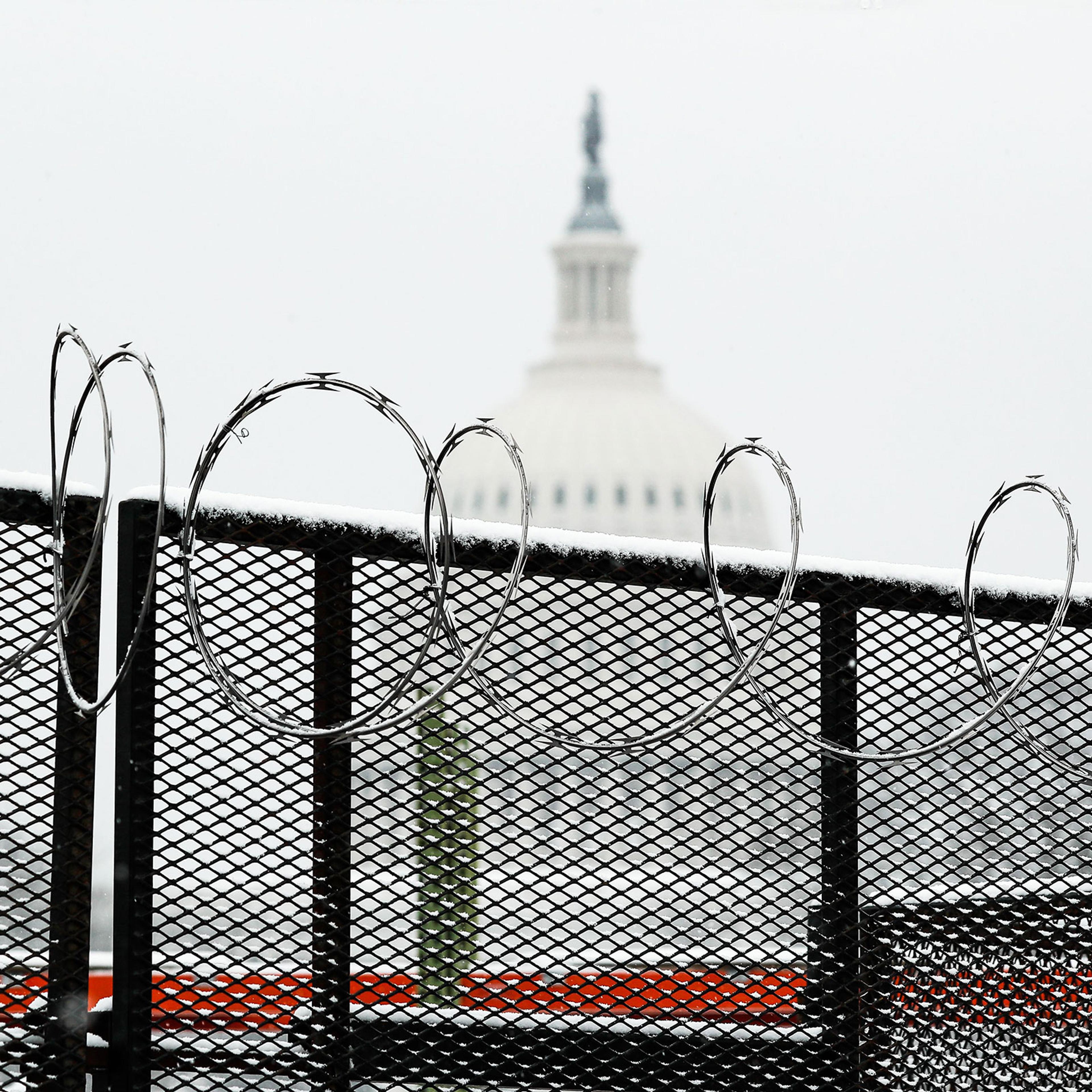 Snow-covered wire on the security fence around the Capitol in Washington, on Jan. 31, 2021.