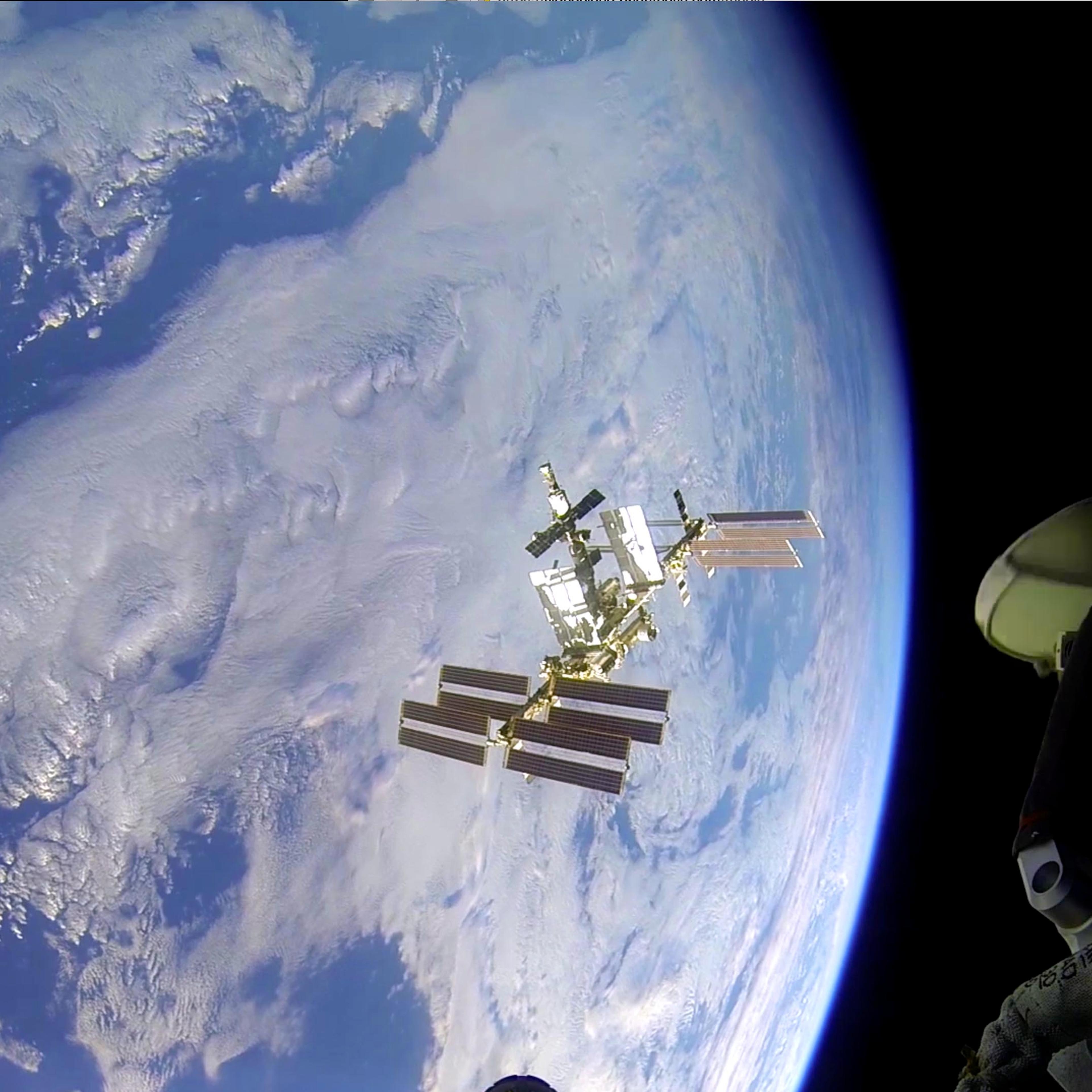 This still photograph shows the view from the window of the Soyuz as it approaches the International Space Station for docking on March 28, 2014.