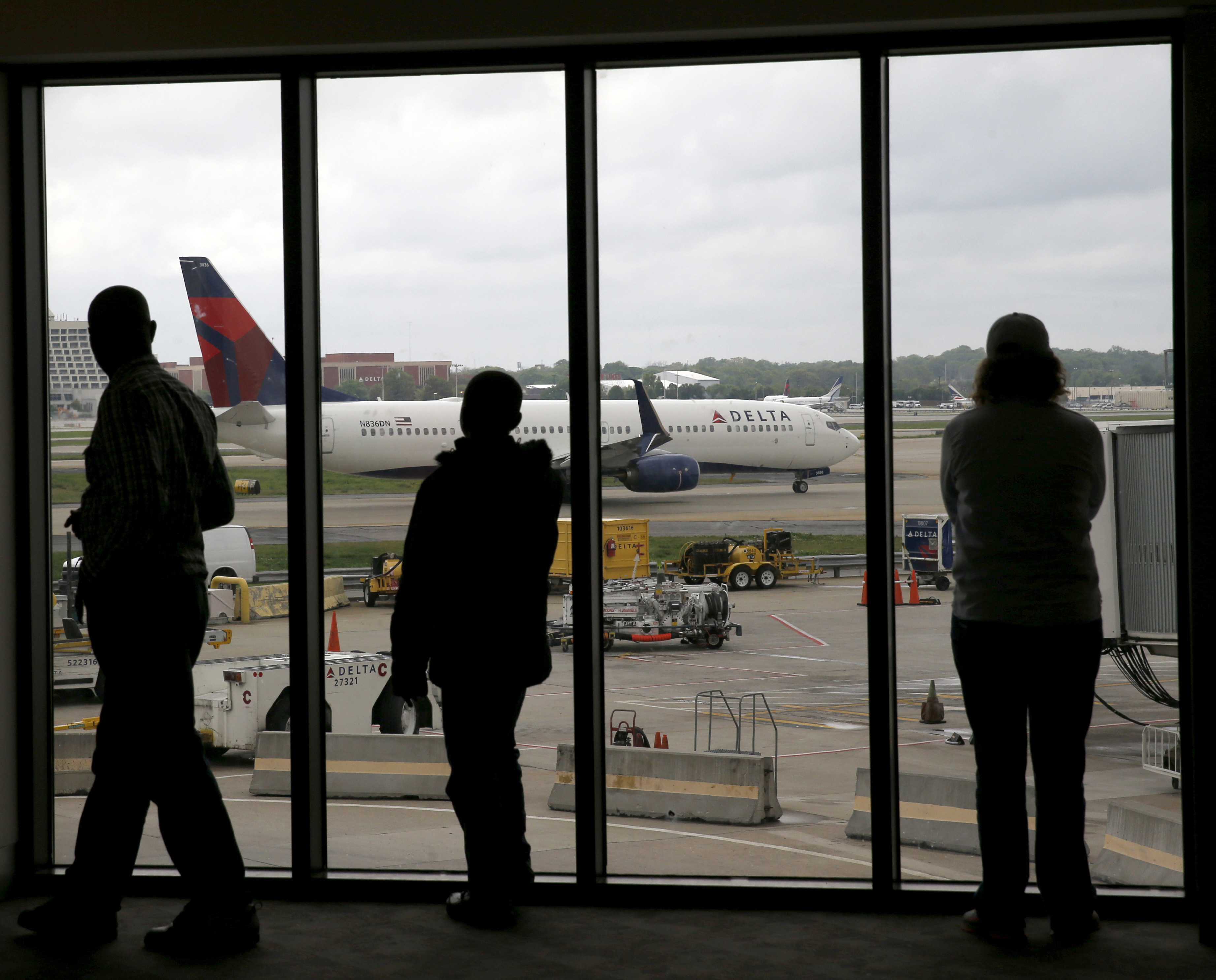 Delta Airlines has today announced that nearly 250 more flights are to be scrapped following a power outage in Atlanta early Monday morning (file photo)