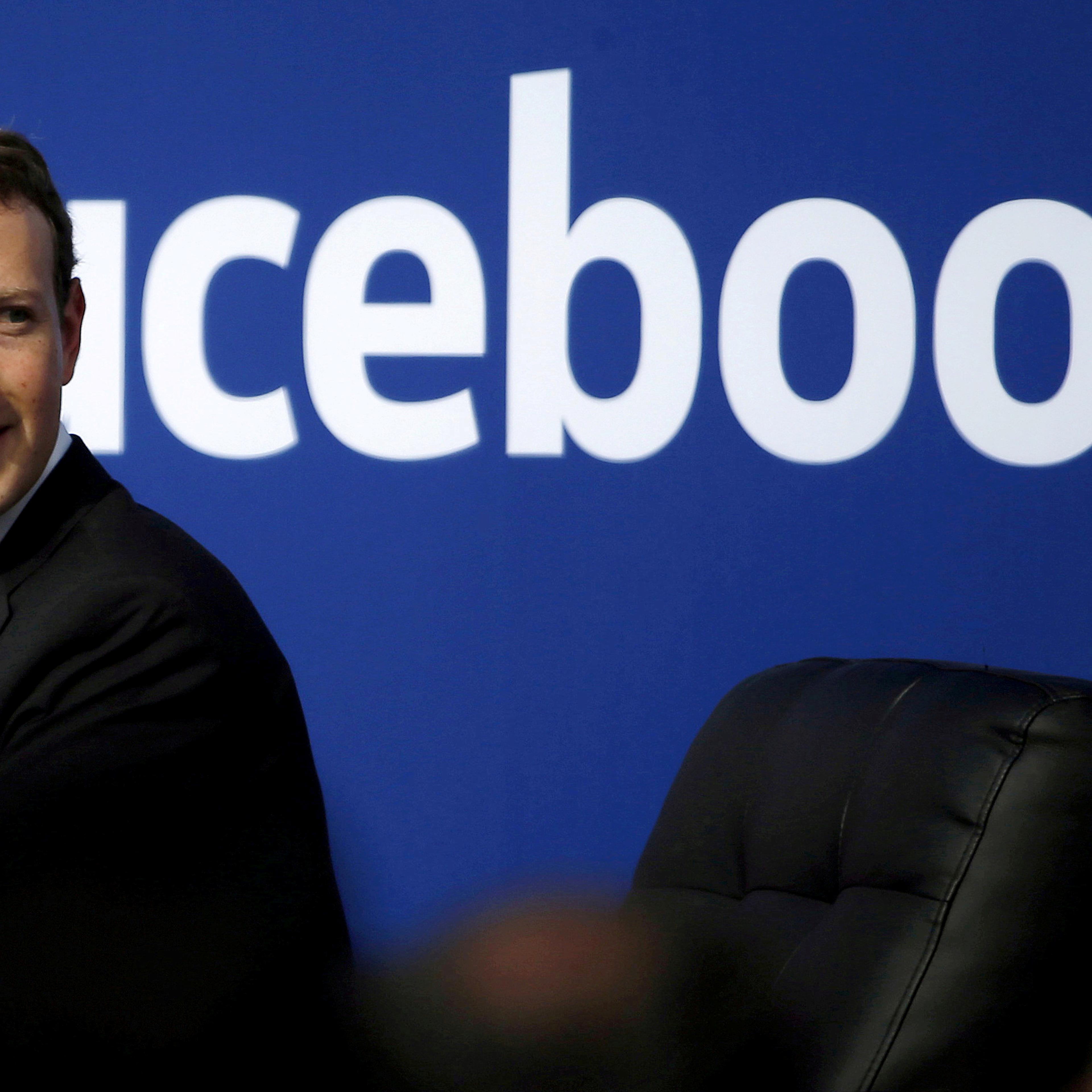 FILE PHOTO: Facebook CEO Zuckerberg during a town hall at Facebook's headquarters in Menlo Park