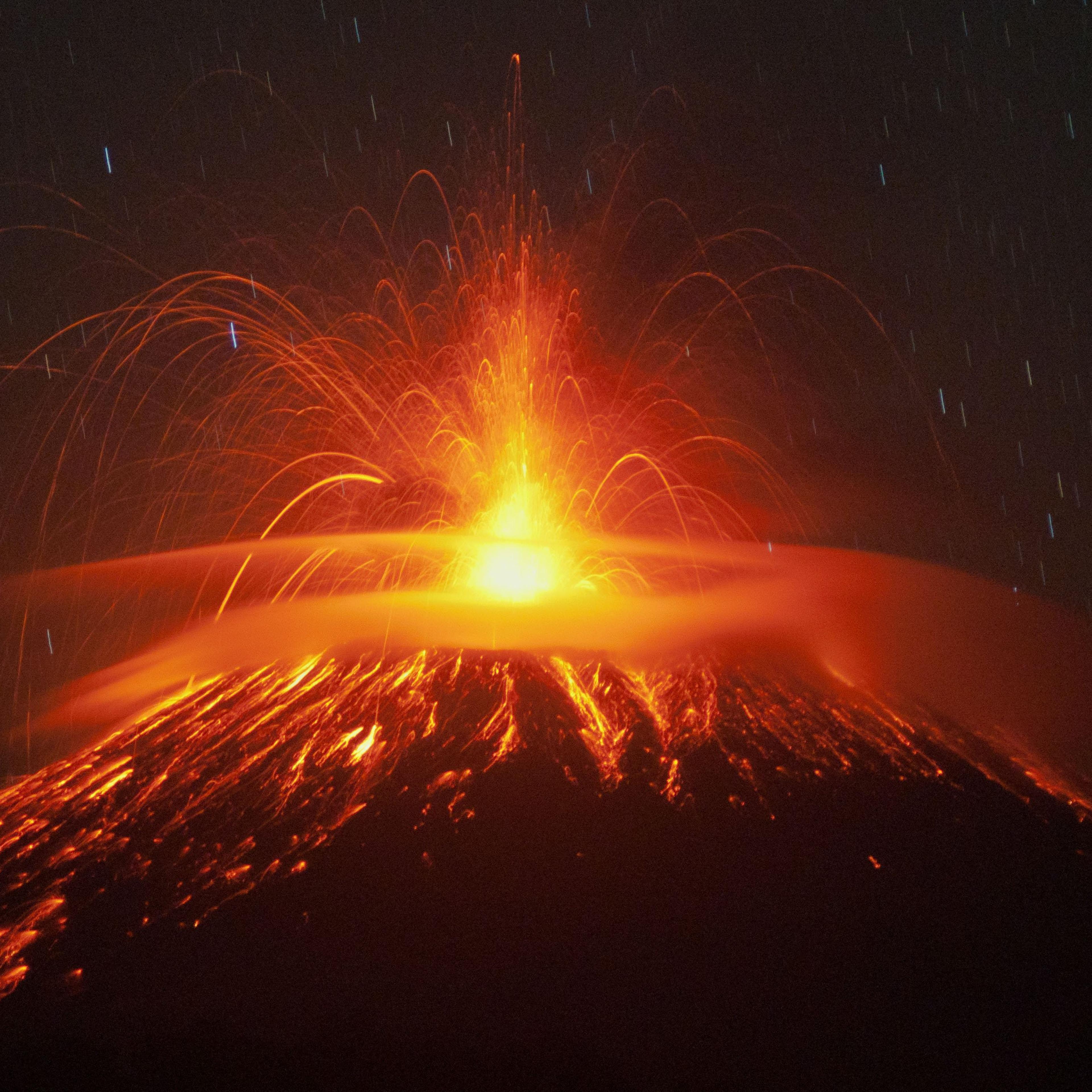 Mount Slamet spews lava and gas during its eruption as seen from Pandansari village in Brebes, Central Java, Indonesia on Sept. 18, 2014.